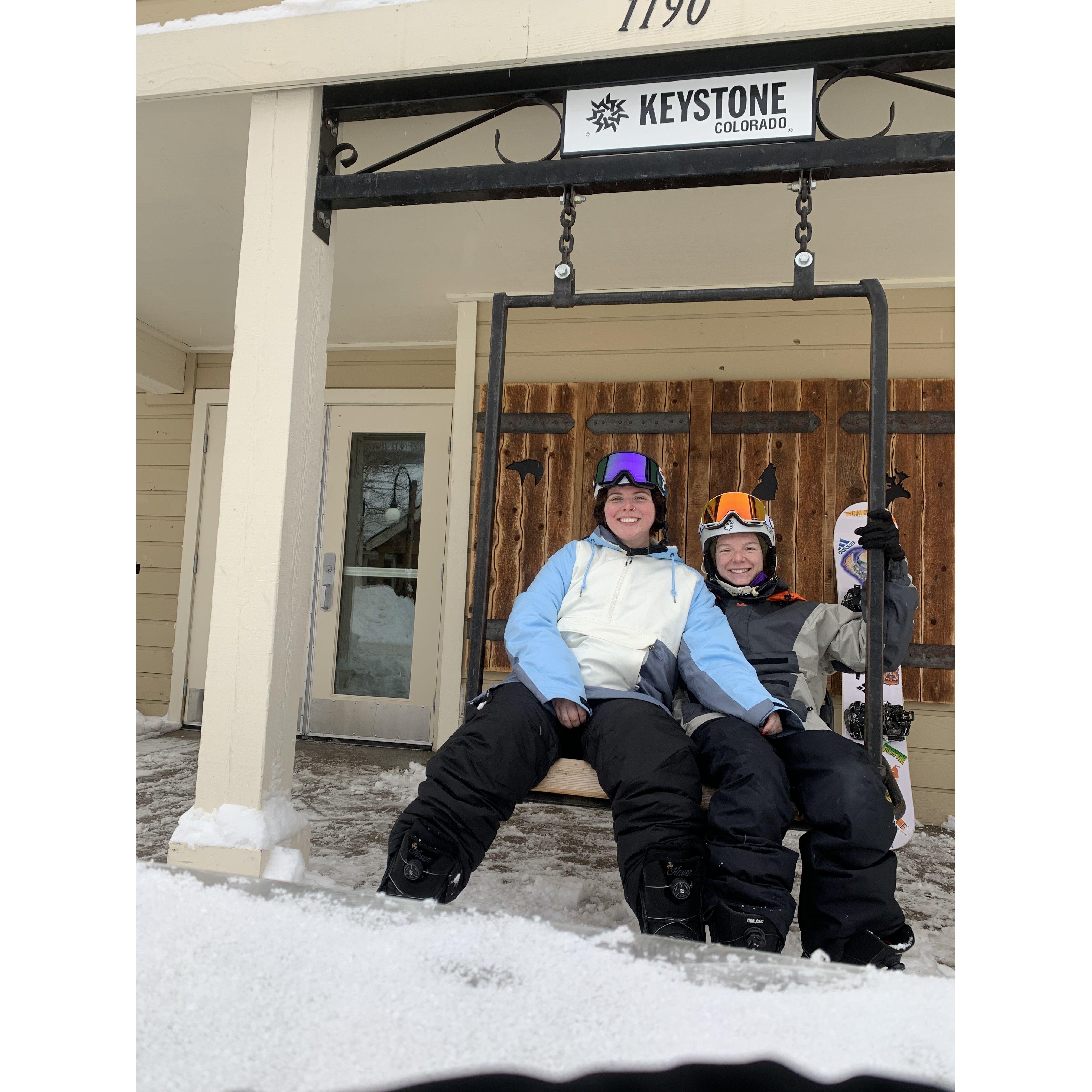 teaching Bailey how to snowboard for the first time in Keystone!