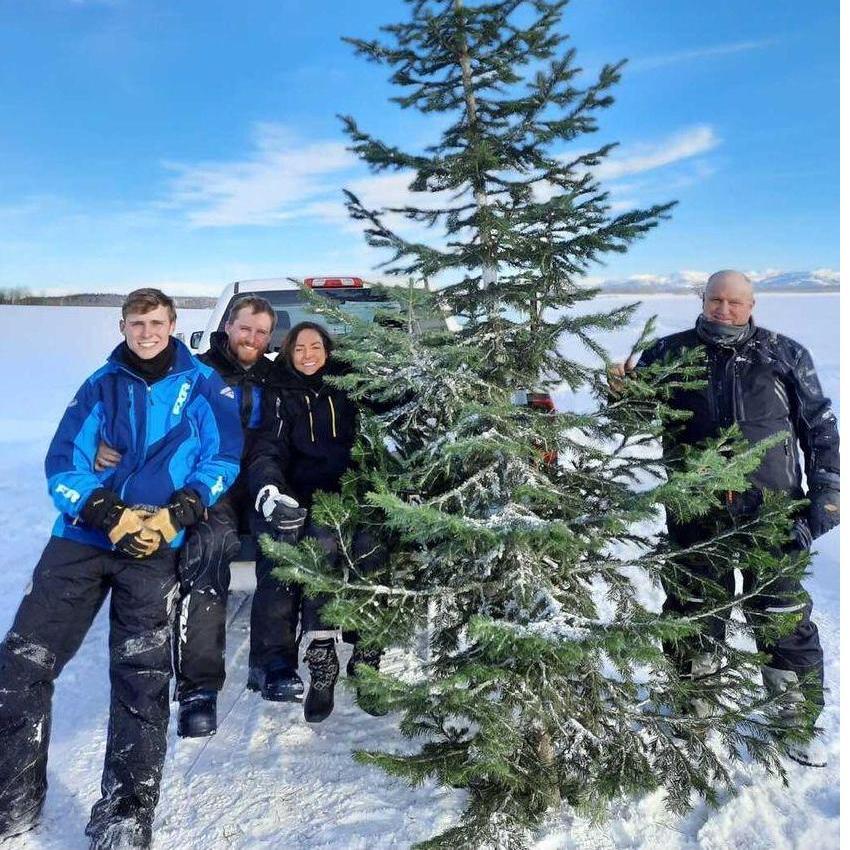 "We trekked up the mountains on our snowmobiles near our home in Squirrel with my brother (Cole) and my dad (Jon) to find our first Christmas tree!" - Cade