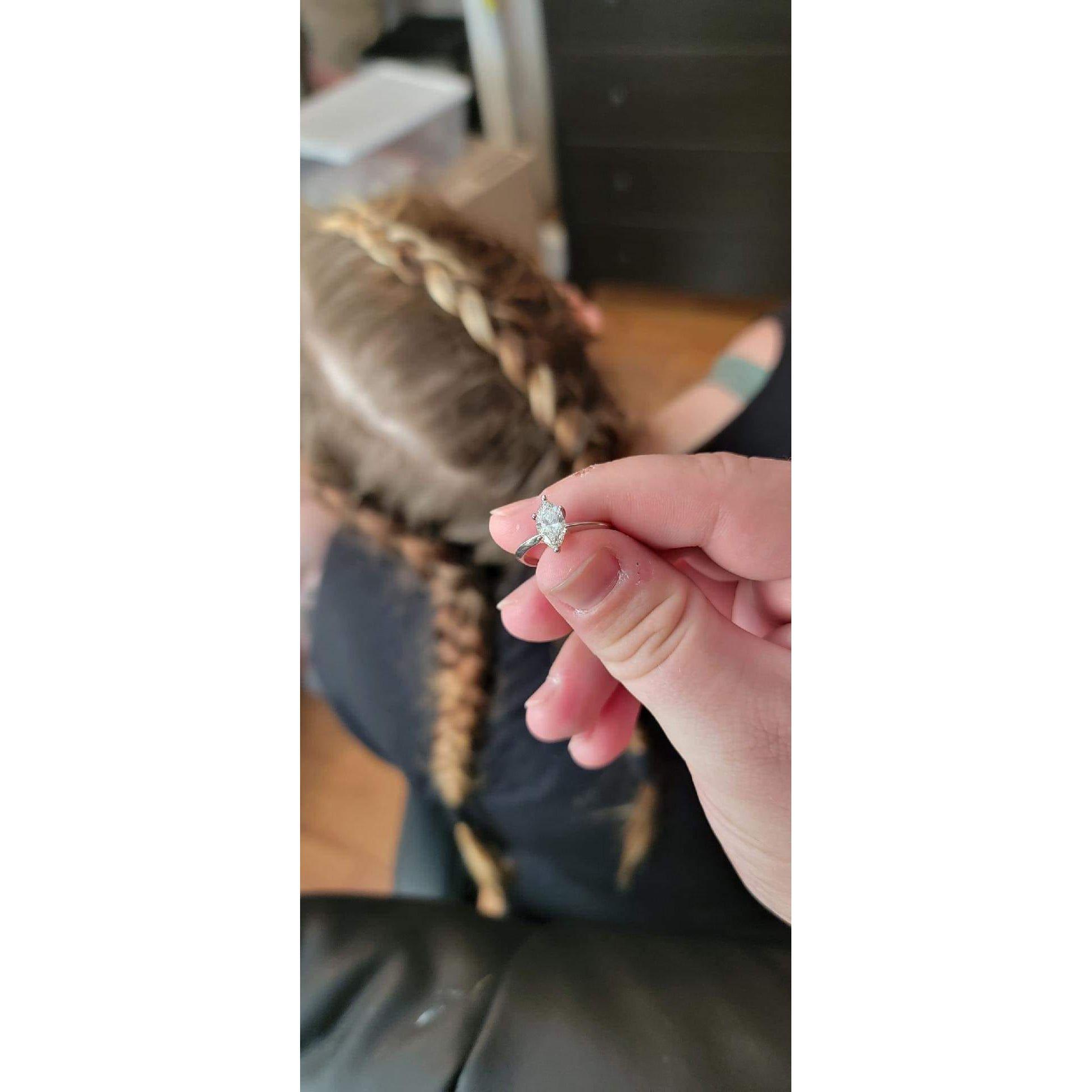 A week before Lucas proposed he took this picture behind Arianna with the ring.