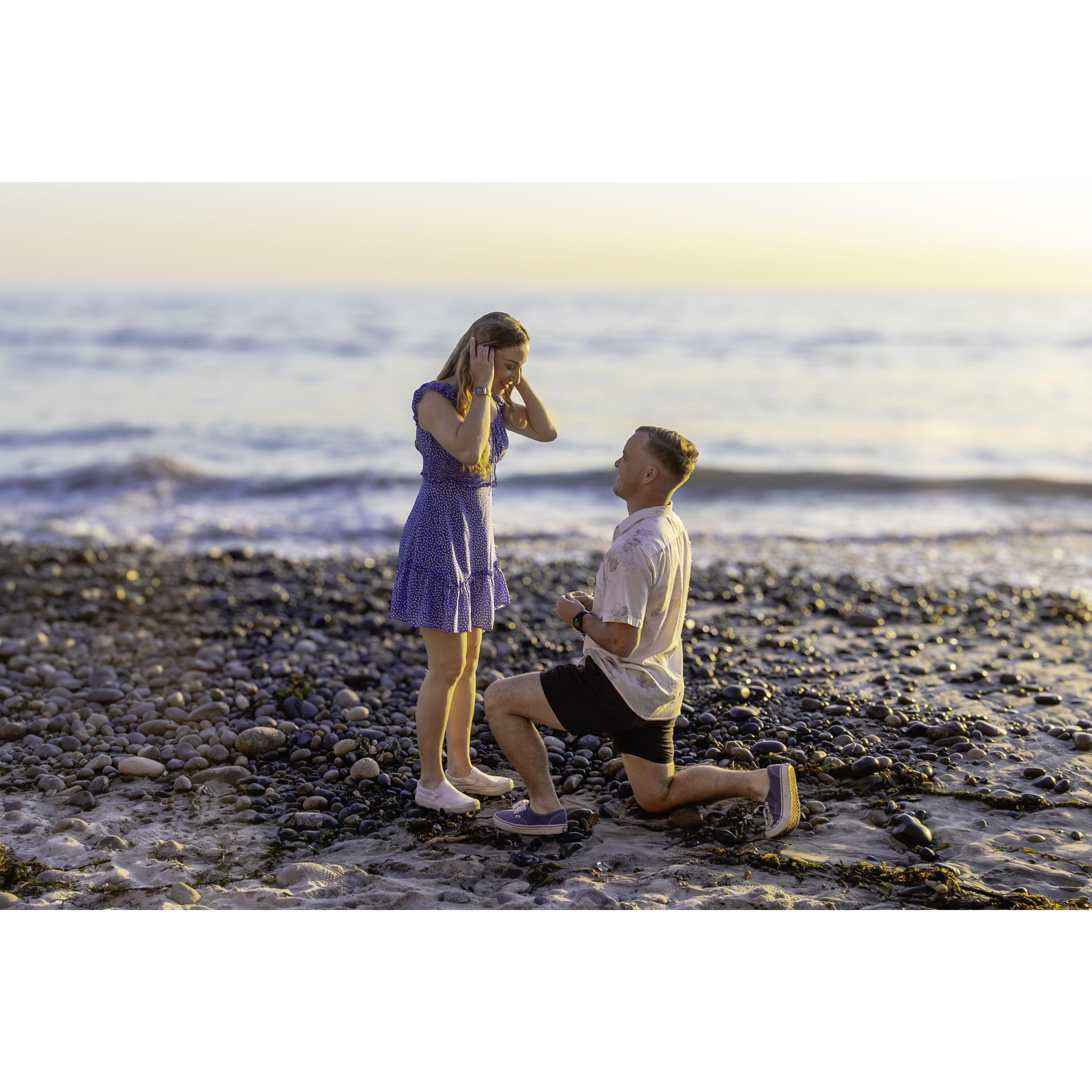Scotty proposed on the beach in Carlsbad, CA. Sean Curran, Scotty's older brother, was there with his camera.