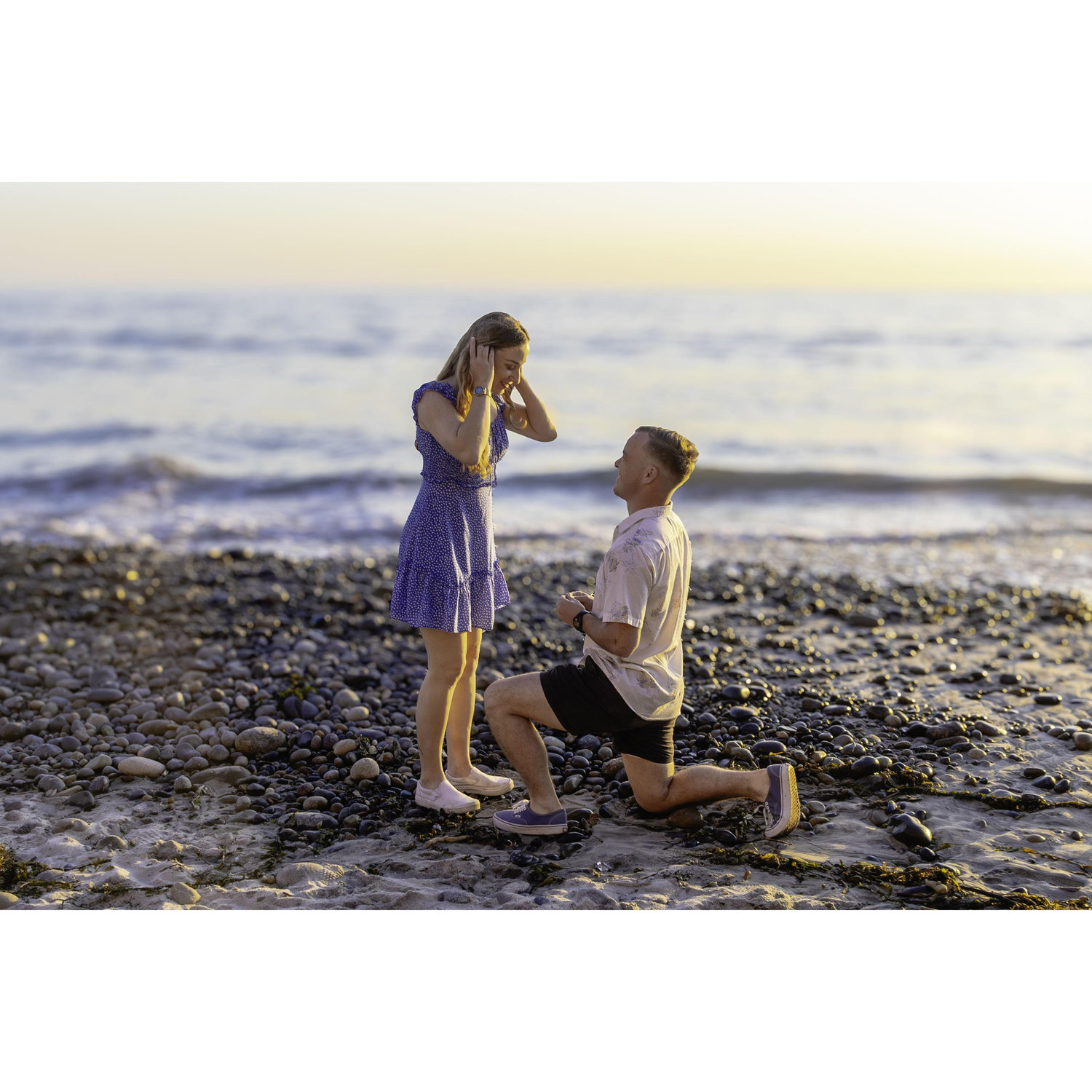 Scotty proposed on the beach in Carlsbad, CA. Sean Curran, Scotty's older brother, was there with his camera.
