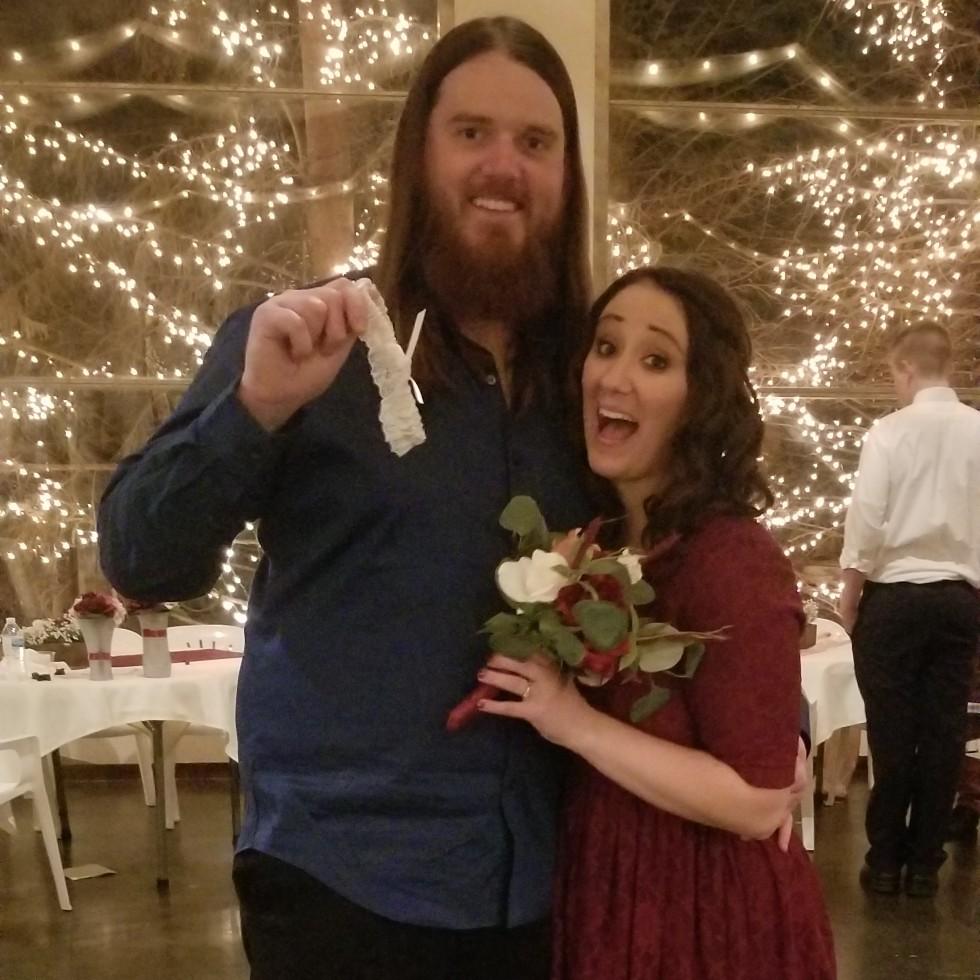 At Emily's sister's wedding, Emily caught the bouquet and Bryan caught the Garter!