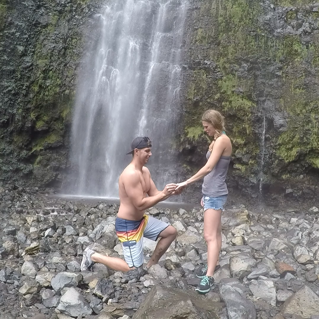 He proposed in Maui at the end of a hike under a waterfall... I almost missed it though because I turned around and started hiking back until I realized Brandon wasn't behind me!