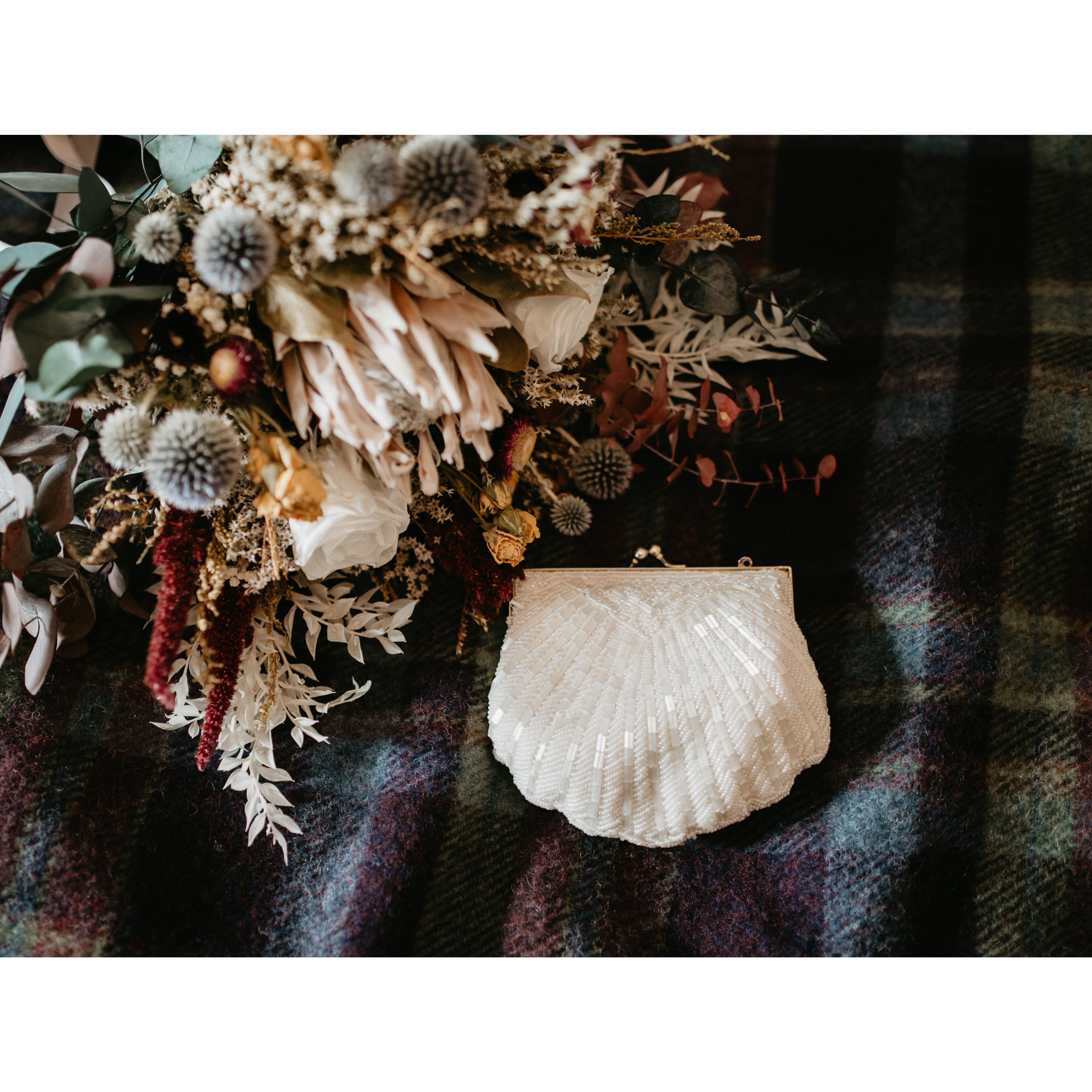 Florals, the blanket Lauren used as her shawl, and the purse Lauren used. The purse was originally the one Kim used on her wedding day, and Julia borrowed it for hers as well!