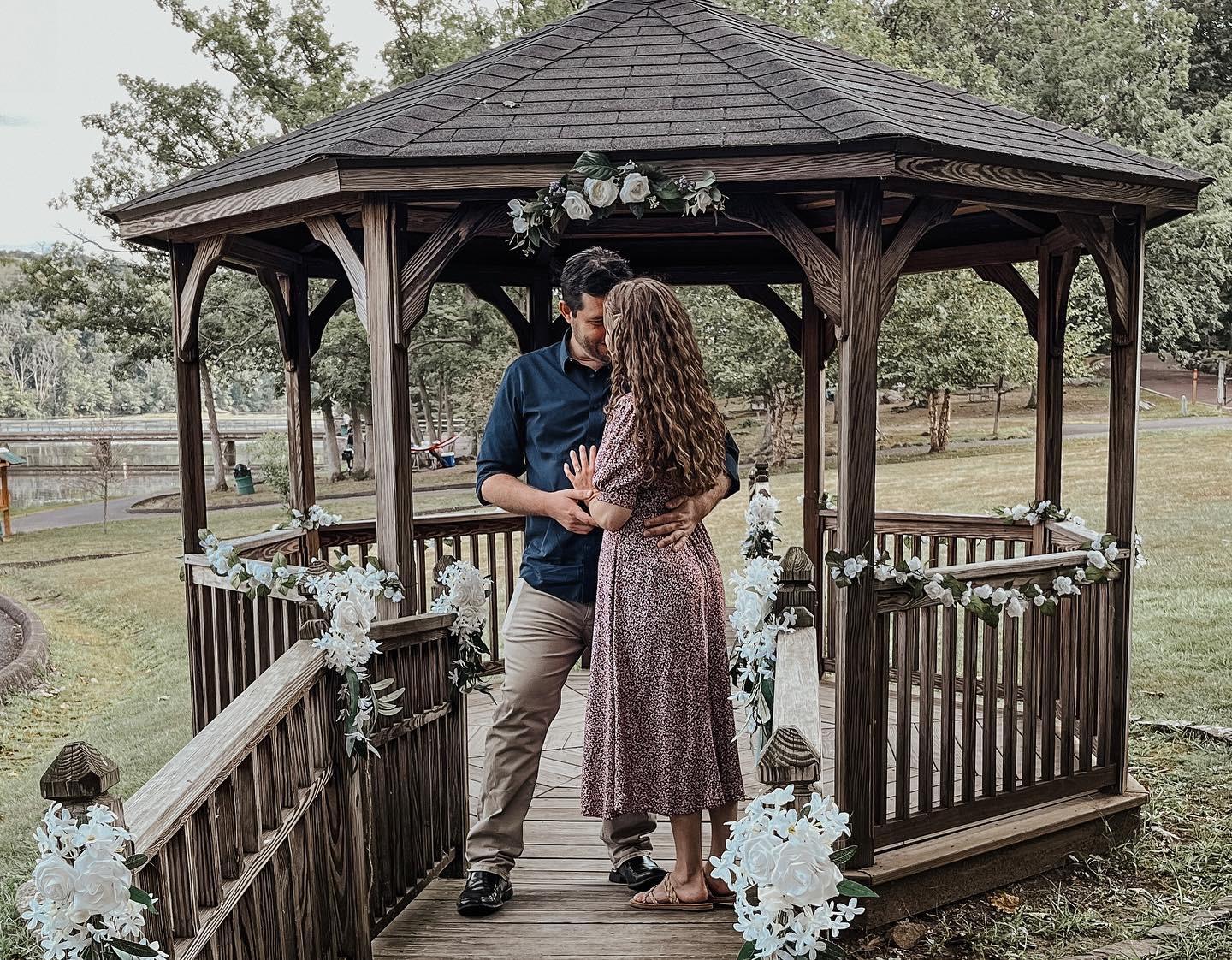 Both families participated in decorating the beautiful gazebo by the lake. Andres chose to propose there because of it's beauty and peacefulness.