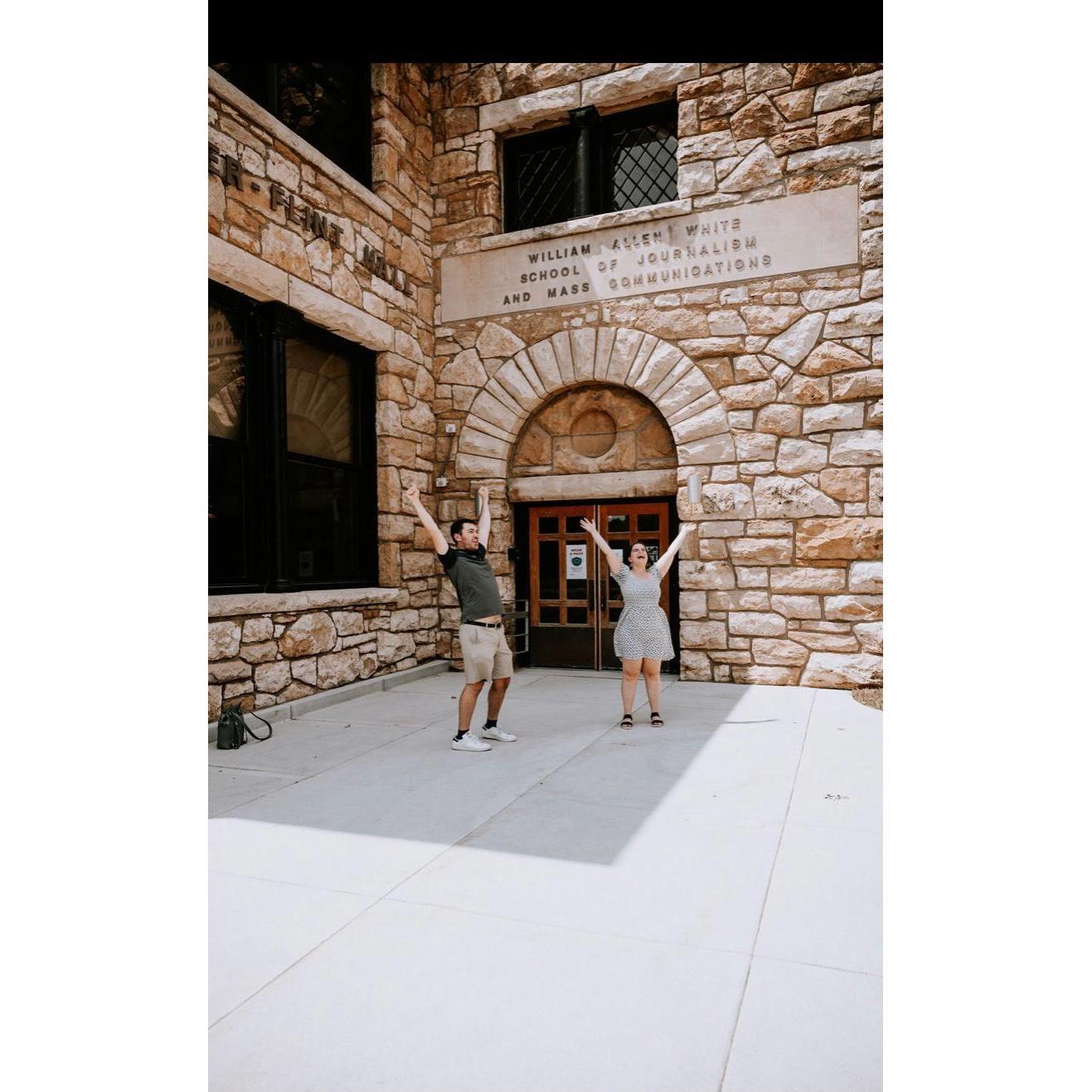 Celebrating their engagement in front of the KU William Allen White School of Journalism, where they have celebrated so many special moments.