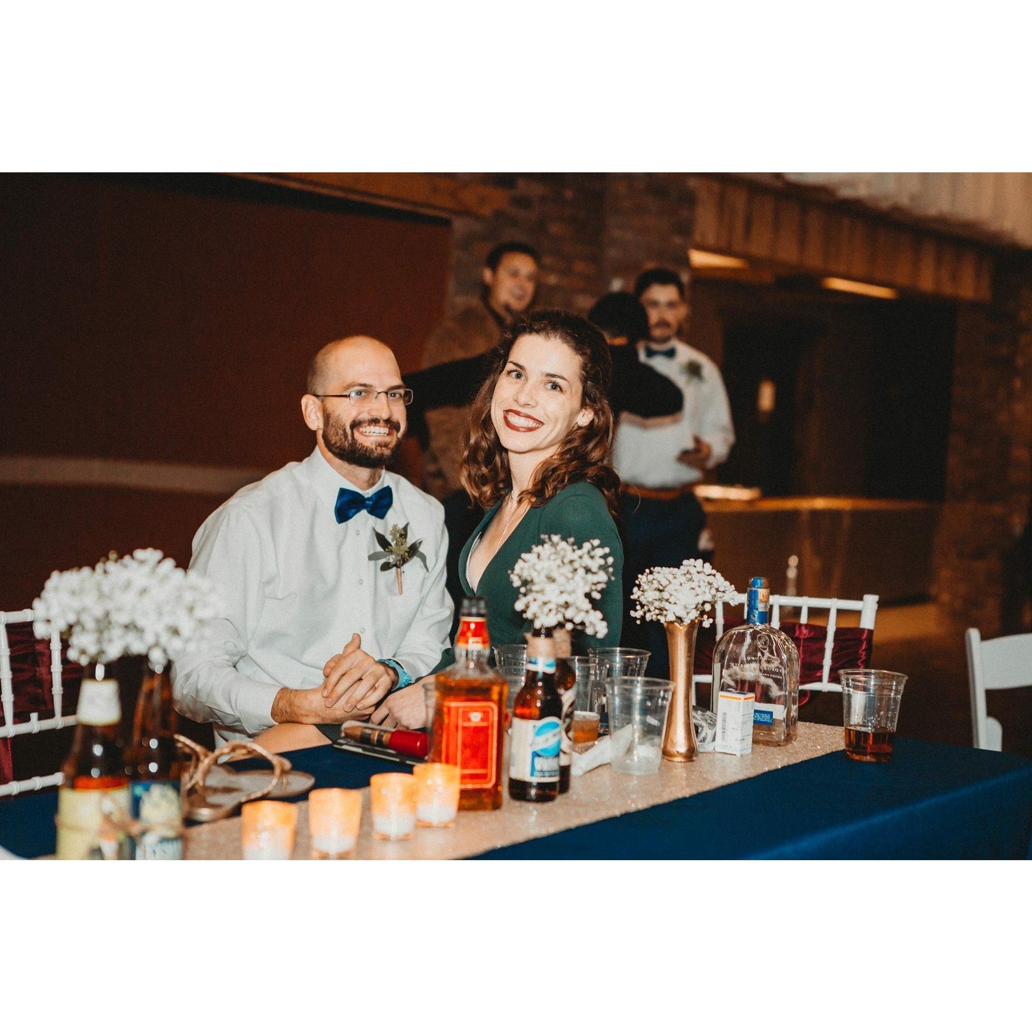 Right before this picture John said, "just because we caught the garter and bouquet doesn't mean we have to get married next...right??"