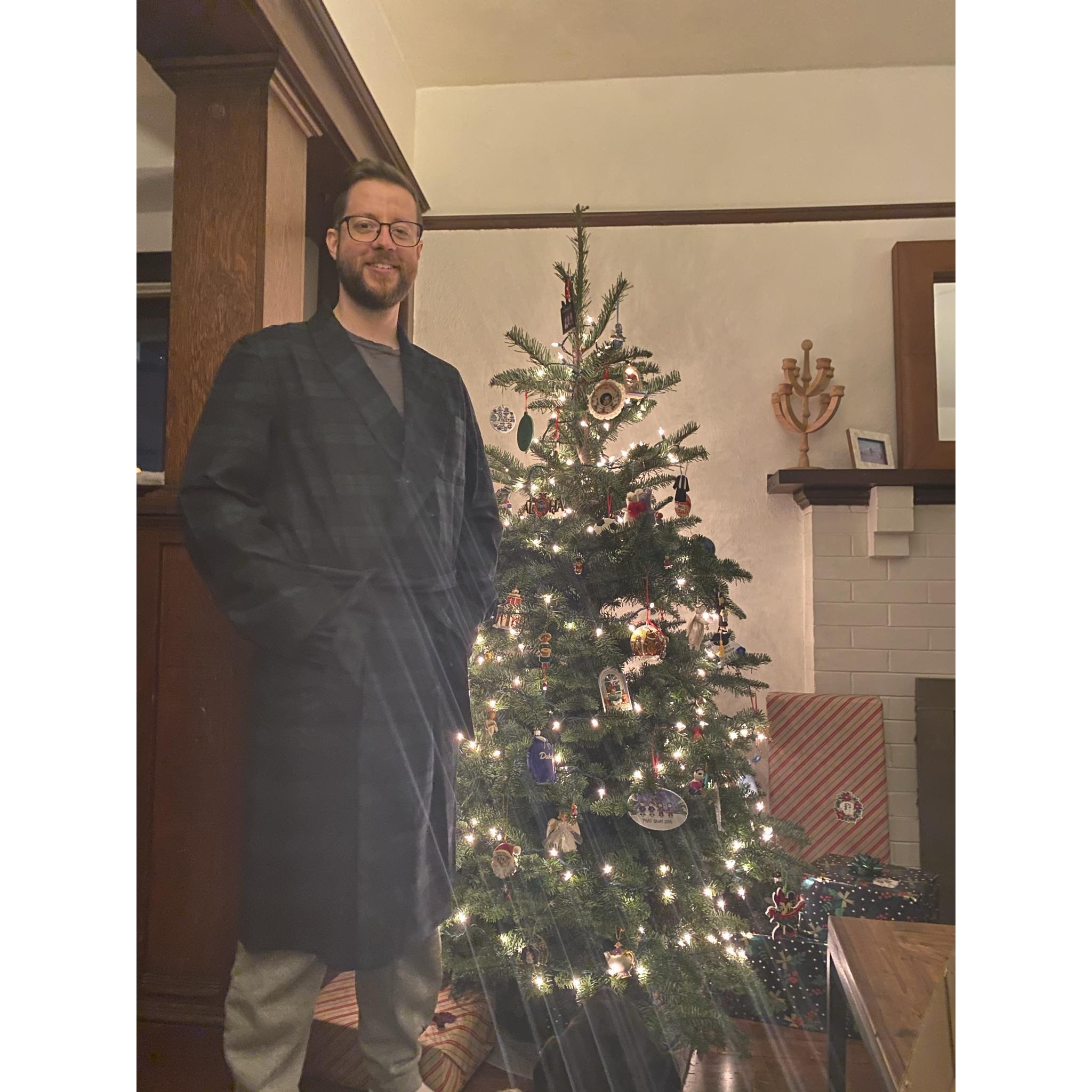 Our first Christmas. Britt got Brandon the bathrobe in the picture--we returned it. Brandon got Britt a necklace--we returned it. Success!