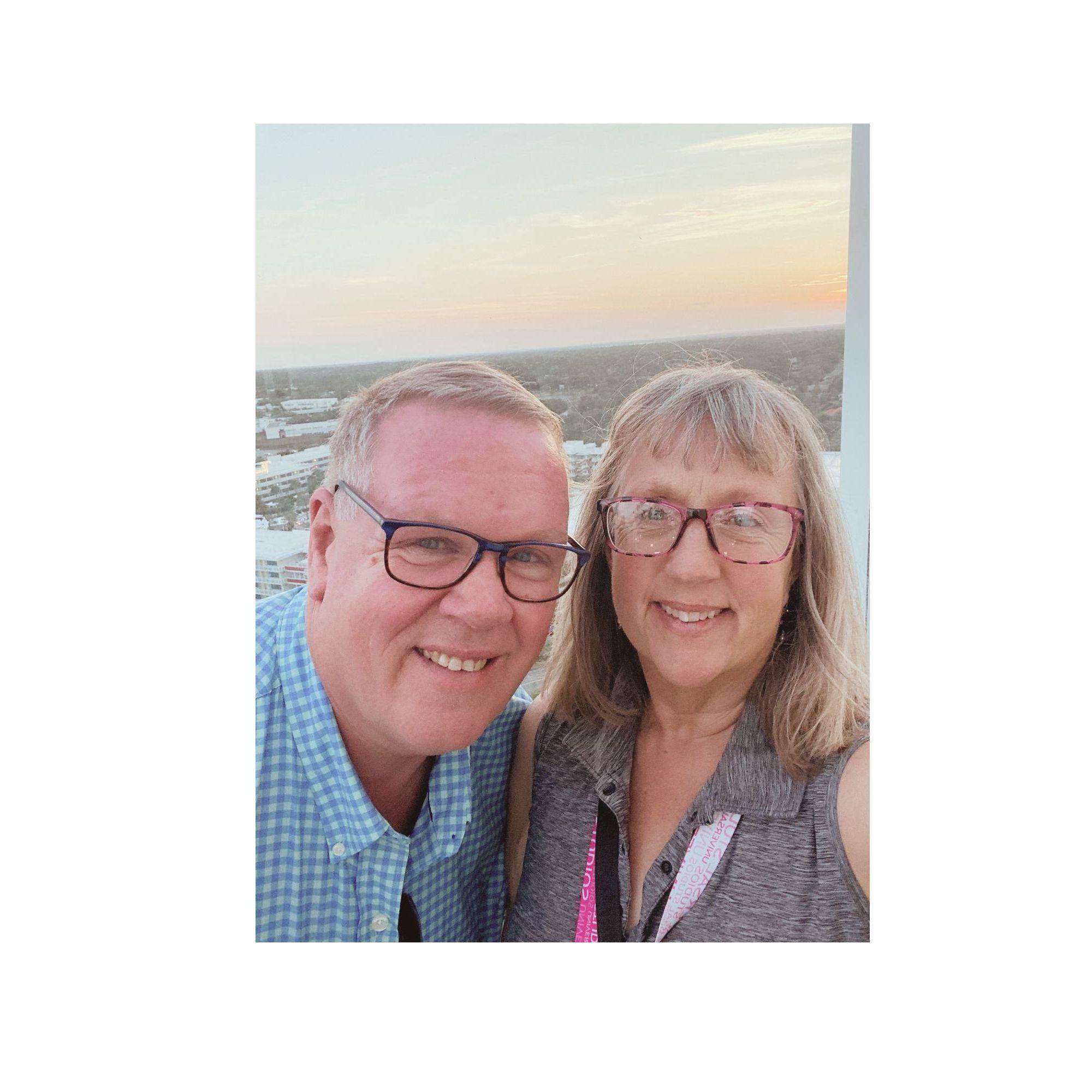 Tim and Tracey with sun setting at Universal Studios in Orlando