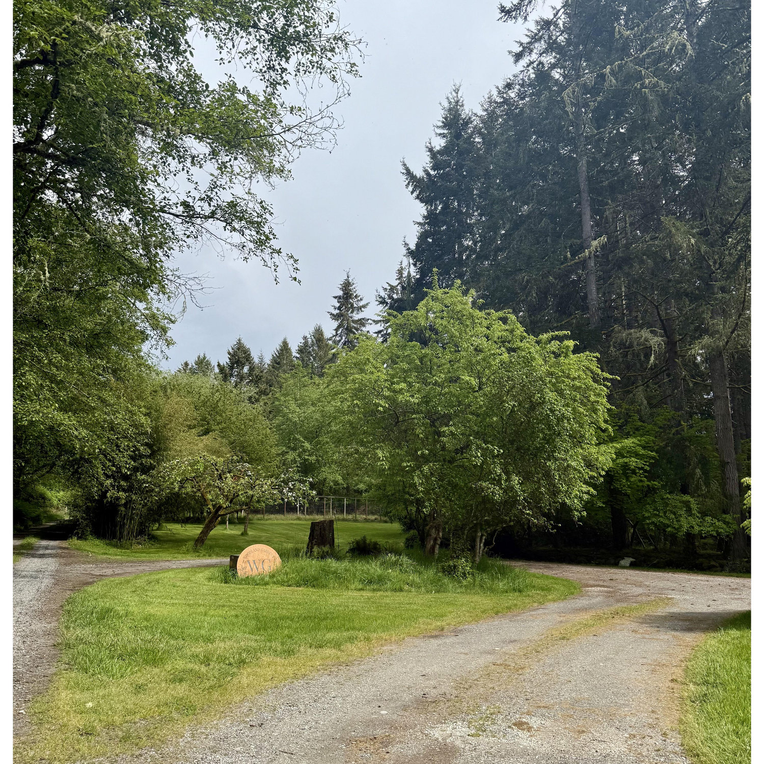 Woodland Gardens Entry. Please continue straight to find parking. Their staff will be there to guide you.