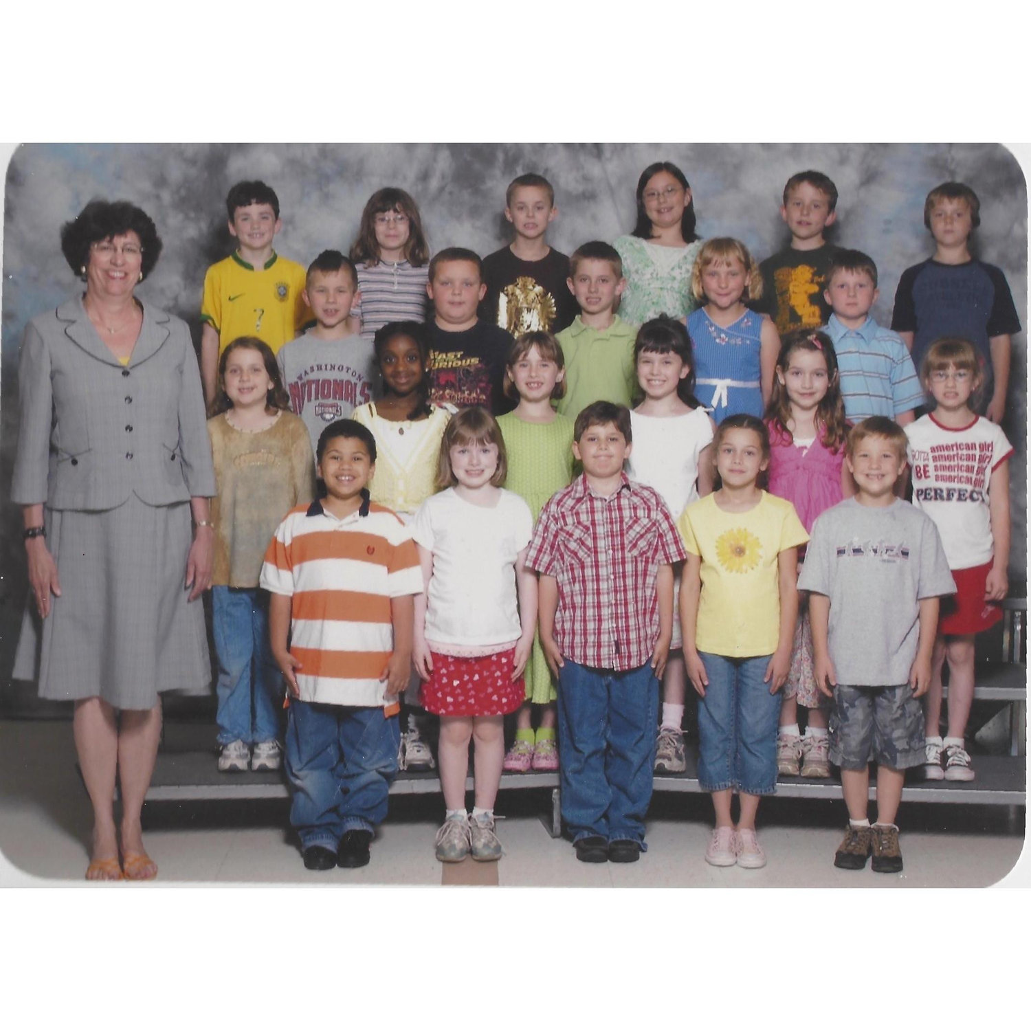 Second grade class photo: Aidan is top row all the way to the left and Cassidy is 3 to the right of Aidan