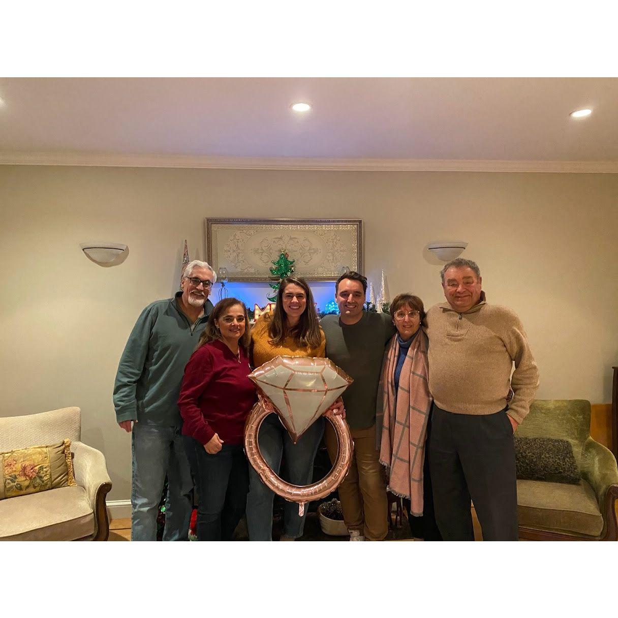 Celebrating our engagement with our parents in December of 2022.