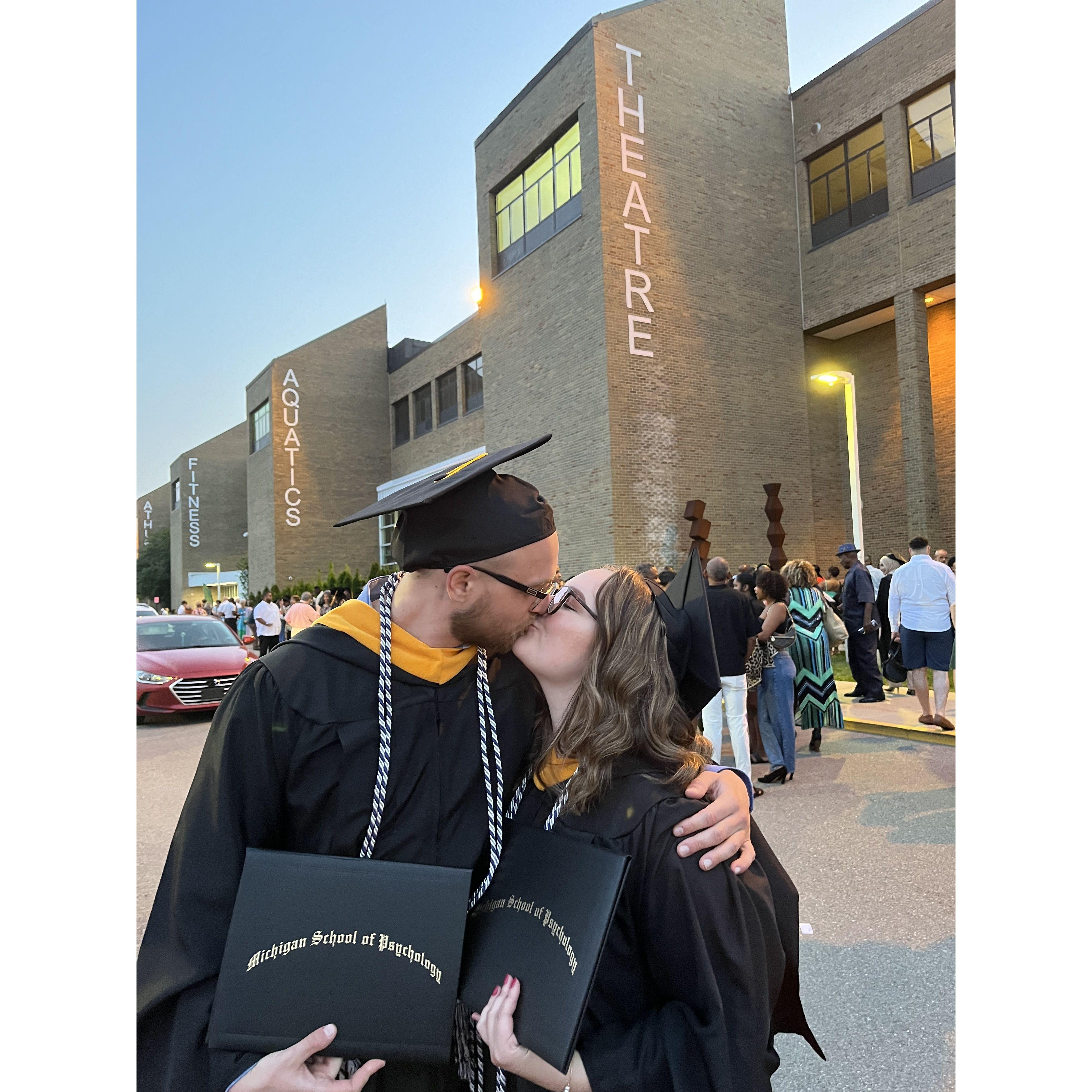 Graduating from the graduate program where we met!