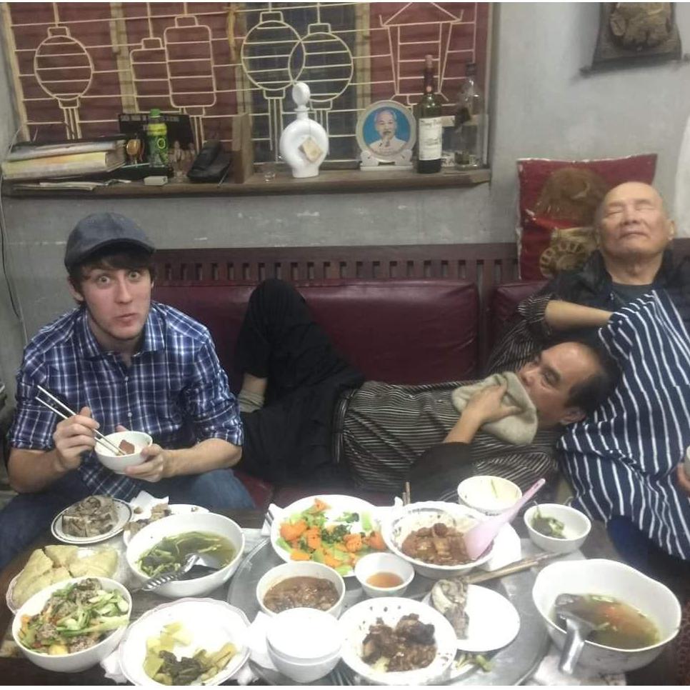 Nathan having family dinner with Nhi's grandpa and dad in Ha Noi. Nathan loved hearing Nhi's grandpa's stories about Viet Nam's history. (December 2014 - Ha Noi, Viet Nam)