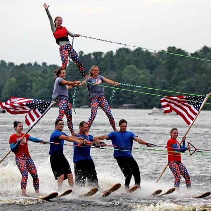 The water ski show is a very important part of our lives. The Hodag Water Shows is where we met! We skied together for 8 years on the team. Cayla- second tier, right. Henry- bottom tier, right.