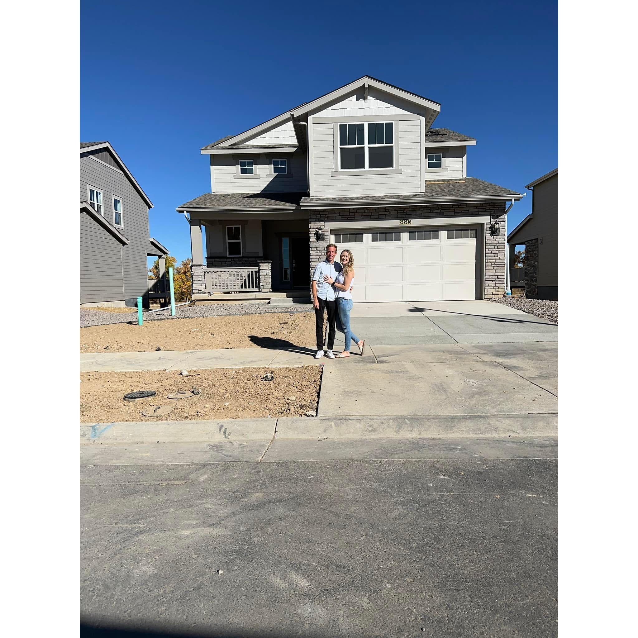 The very first picture of us in front our first home. Purchased in November 2023.