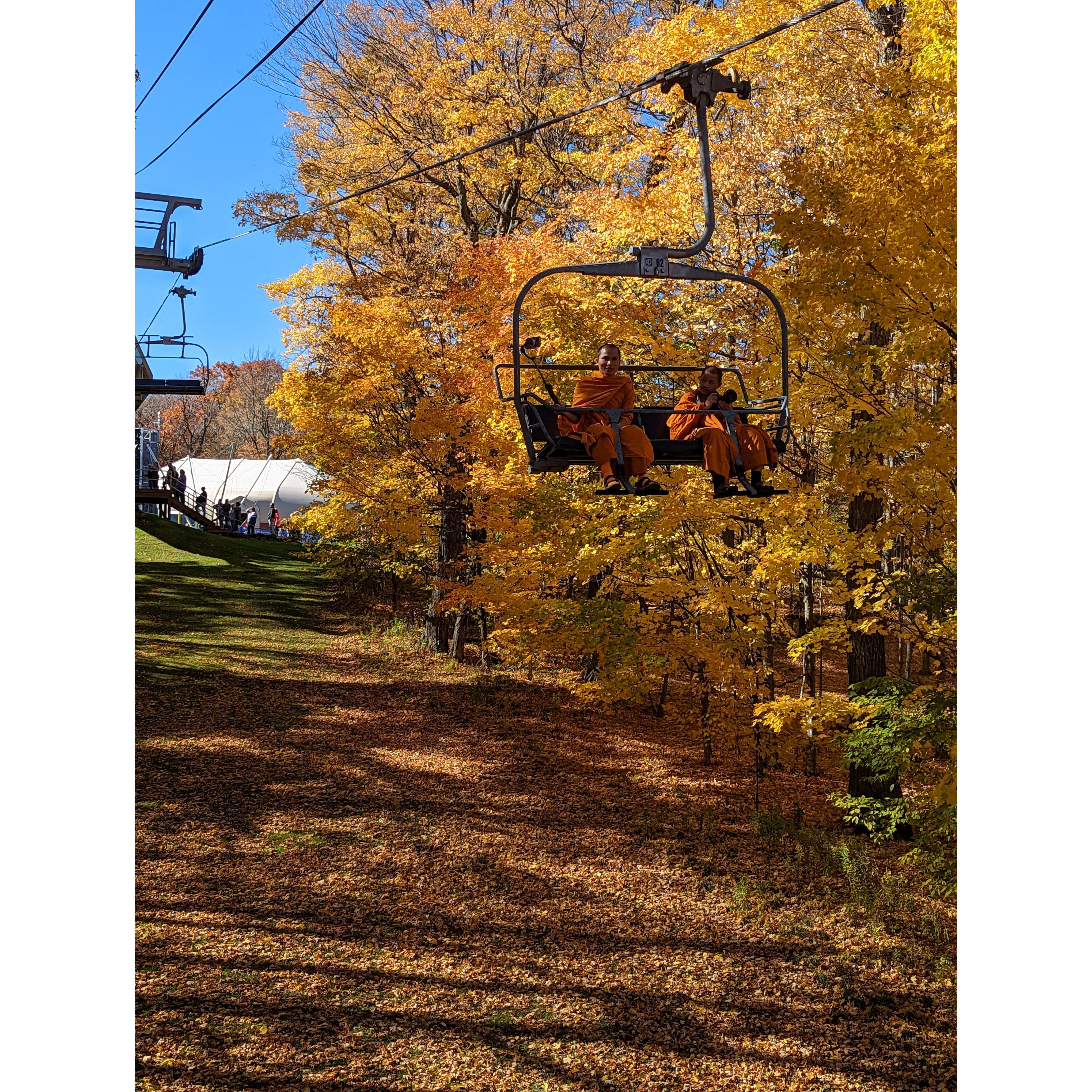 Yes.... a monk on a chair lift with a selfie stick!!!
