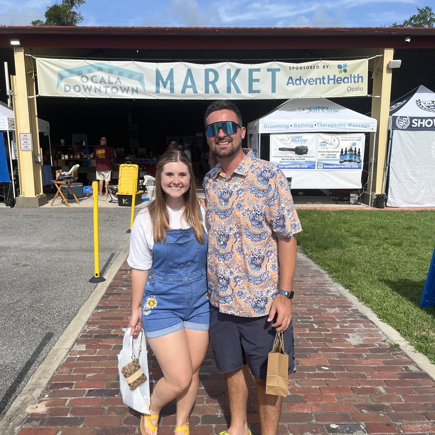 While we love far and wide adventures, we love local ones too!! Our favorite farmers market!! We love to grab a coffee and a sausage bomb here.