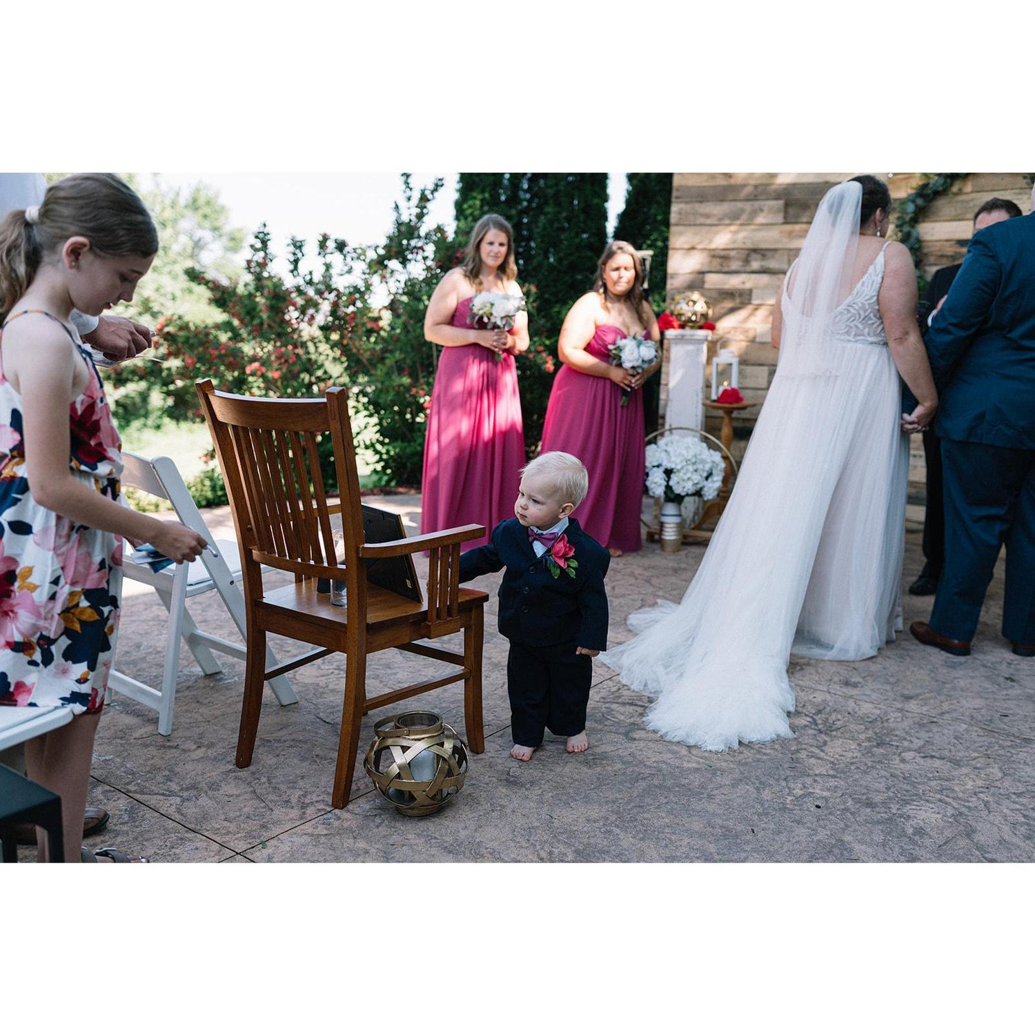 Checking out the Mother of the Bride's seat!