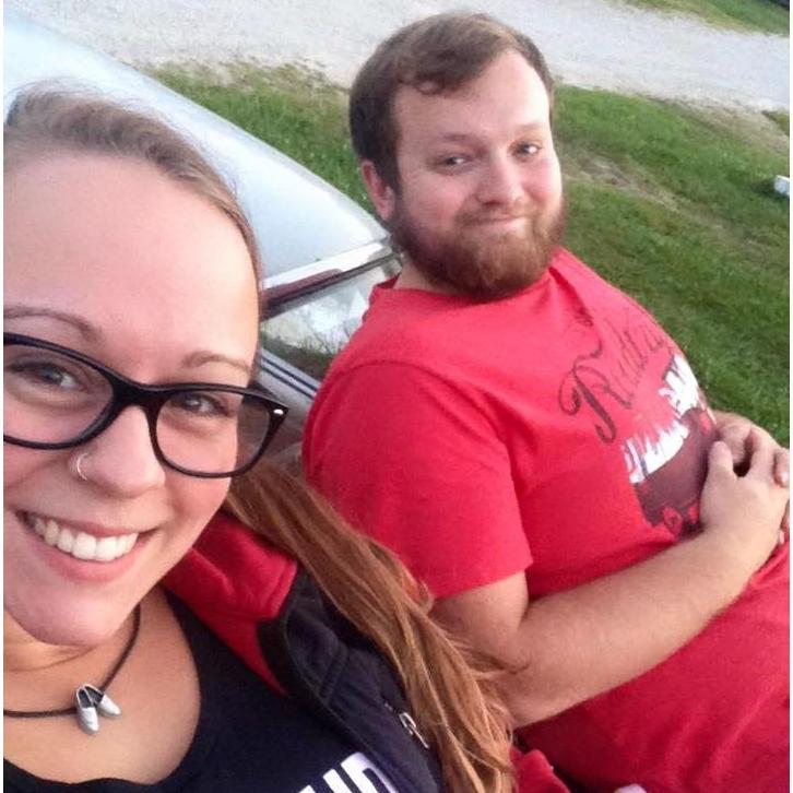 Laying on the hood of the 'stang at the drive-in movie!