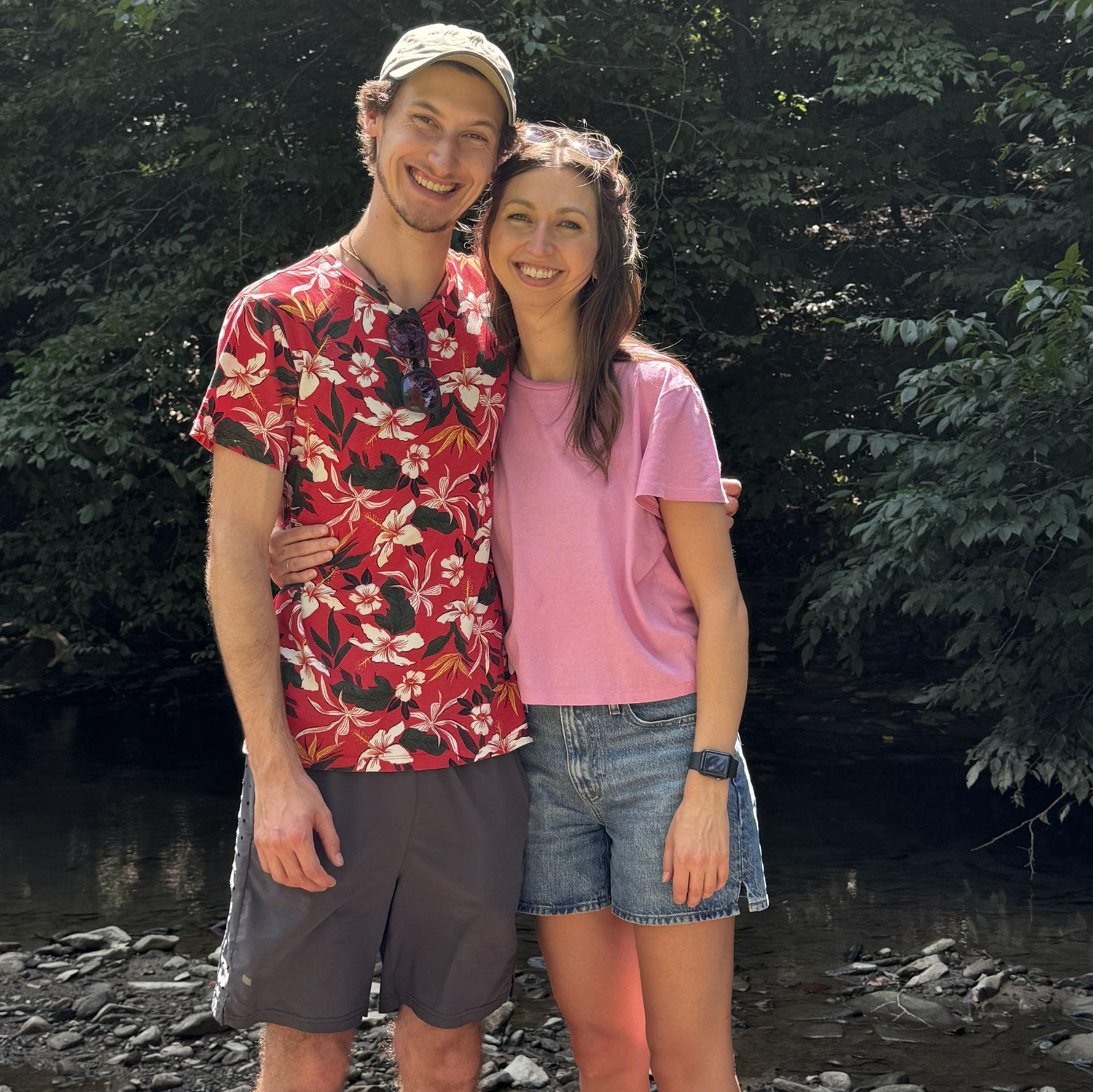 This is our first photo together! We were at a church picnic and our wonderful friend Emilie (who is also in large part the reason we're together!) took this for us :)