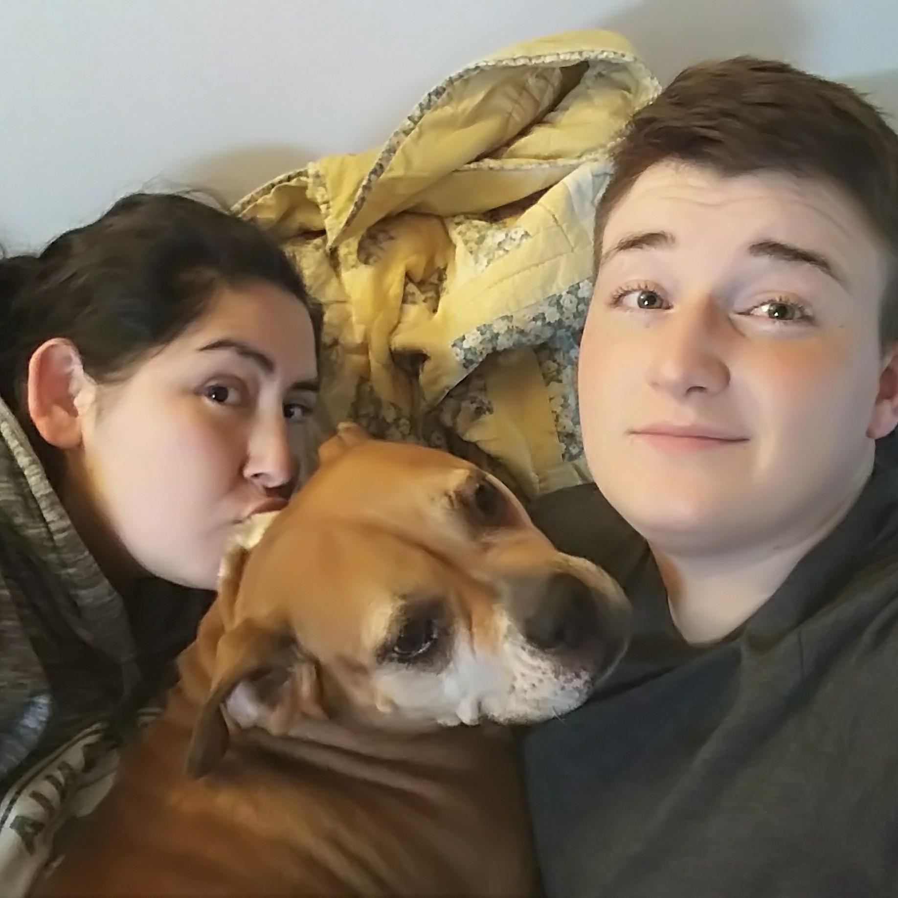 More couch cuddles! Although I am not sure who loves pictures more, Andi or Tikka.