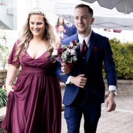 Walking down the aisle together at Marina's sisters wedding!