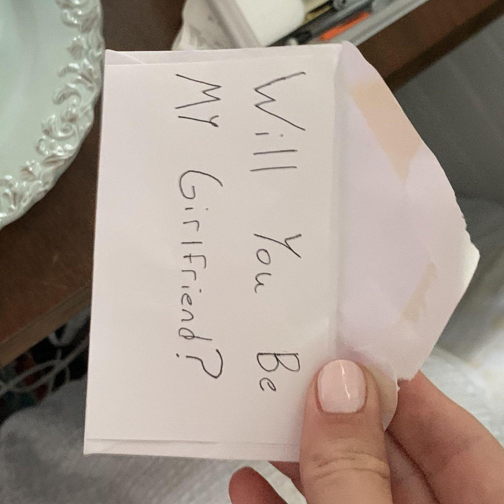 Preston asked me to be his girlfriend before PT Prom. He brought me pink roses and wrote me a note.