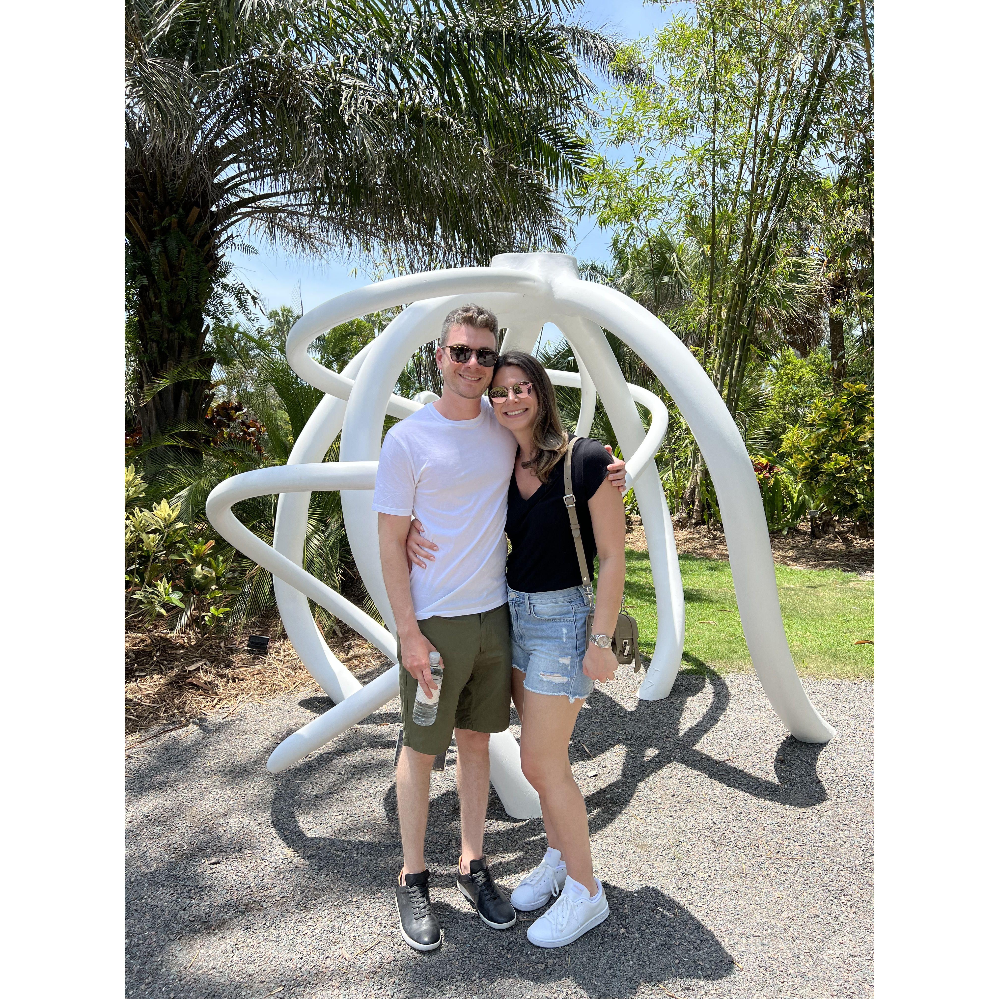 Our first photo together. Statue of less importance