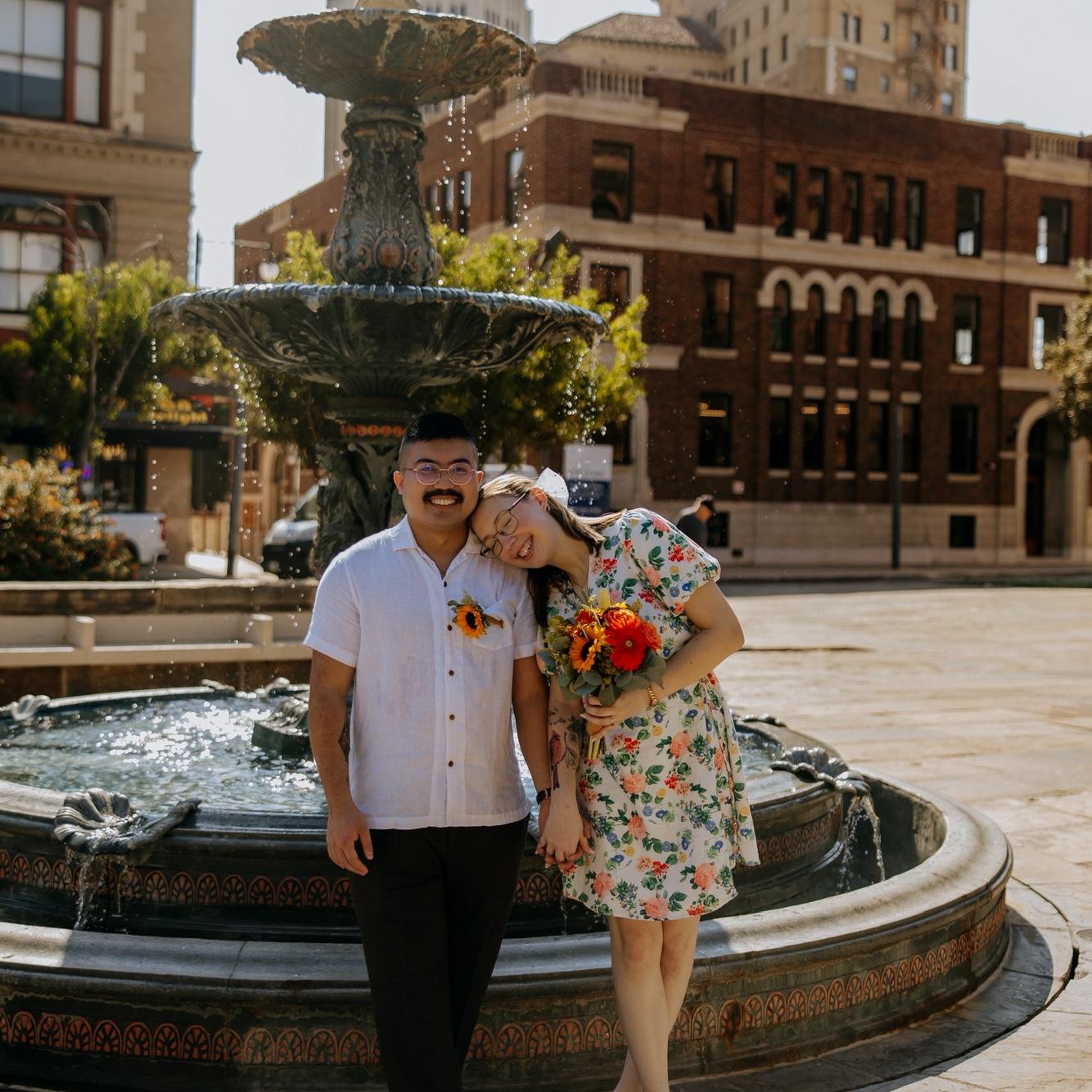 One of our favorite pictures from our wedding day. Right by the Lady Justice Fountain in front of Downtown Bexar County Courthouse!