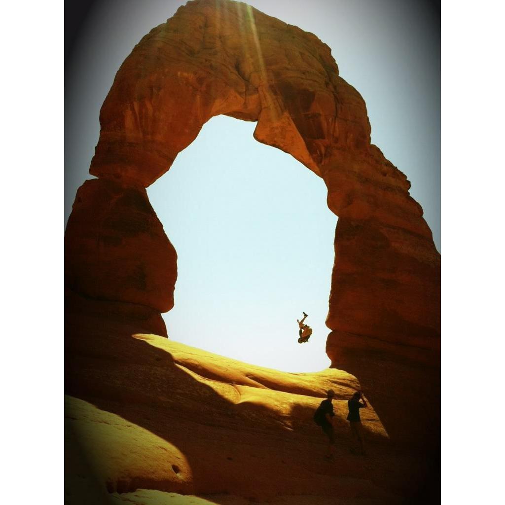 Brian back-flipping in Delicate Arch, 2012