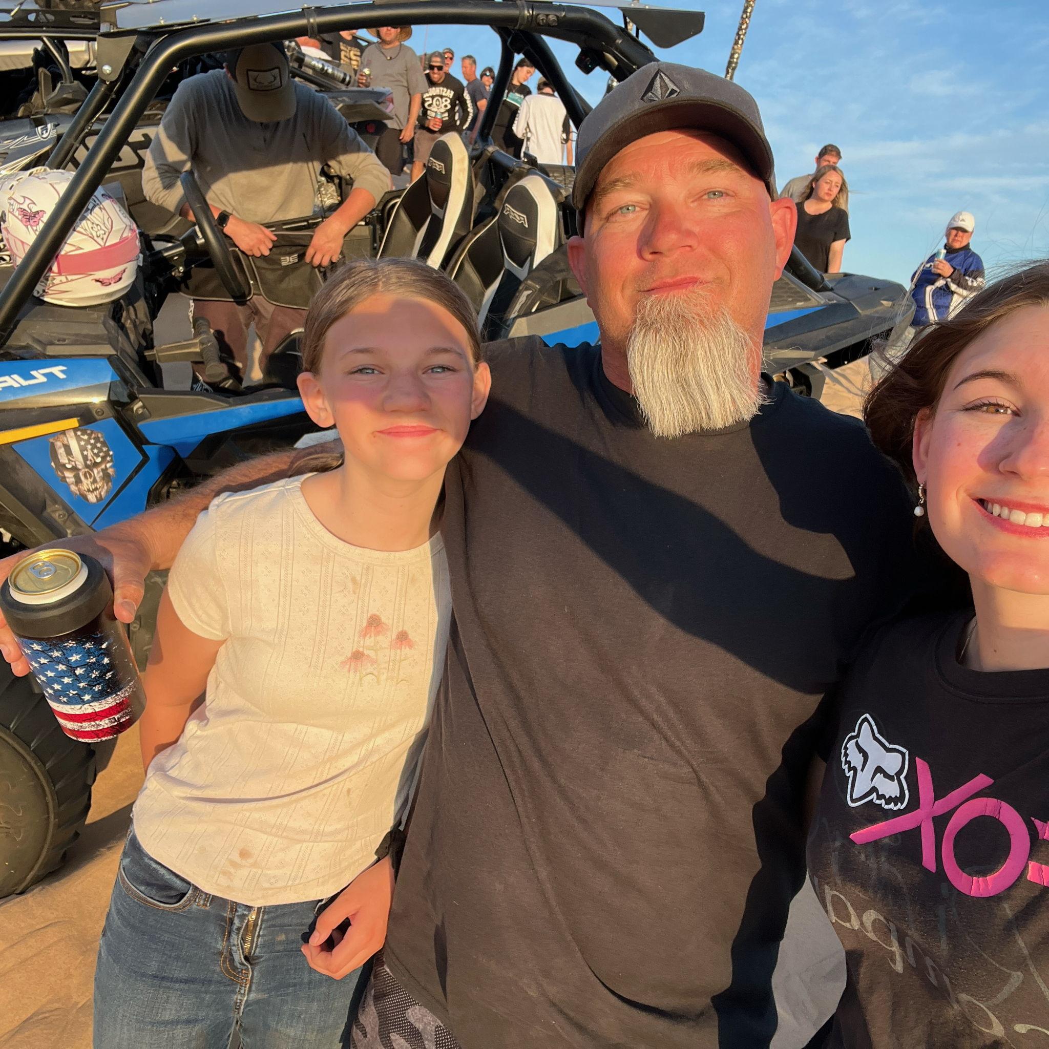 Justin is getting the ring in the background of this picture!