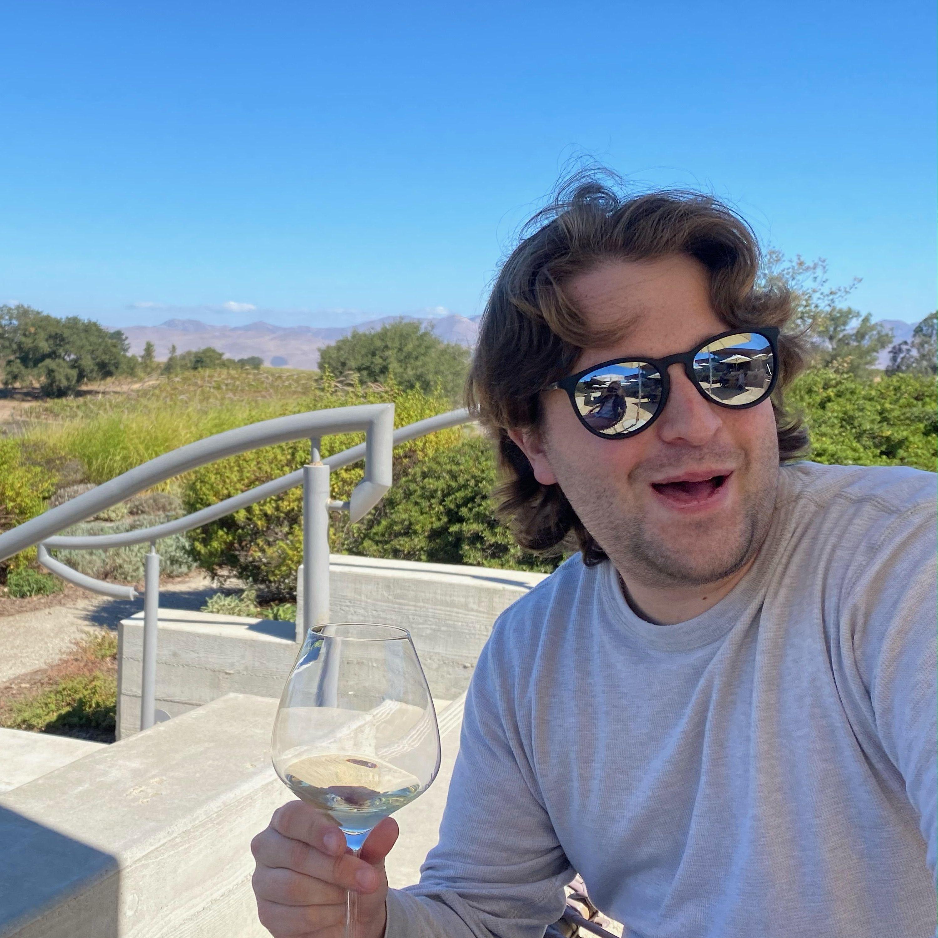 With a glass of wine and a view like that, Shane is happy with his birthday present to Santa Barbra.