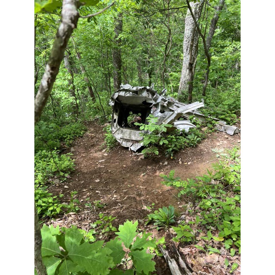 A B-25 crashed into Sharptop Mountain during WWII. The fuselage is there for anyone who wants to venture off trail to see  https://www.youtube.com/watch?v=KySjKNaW9vU