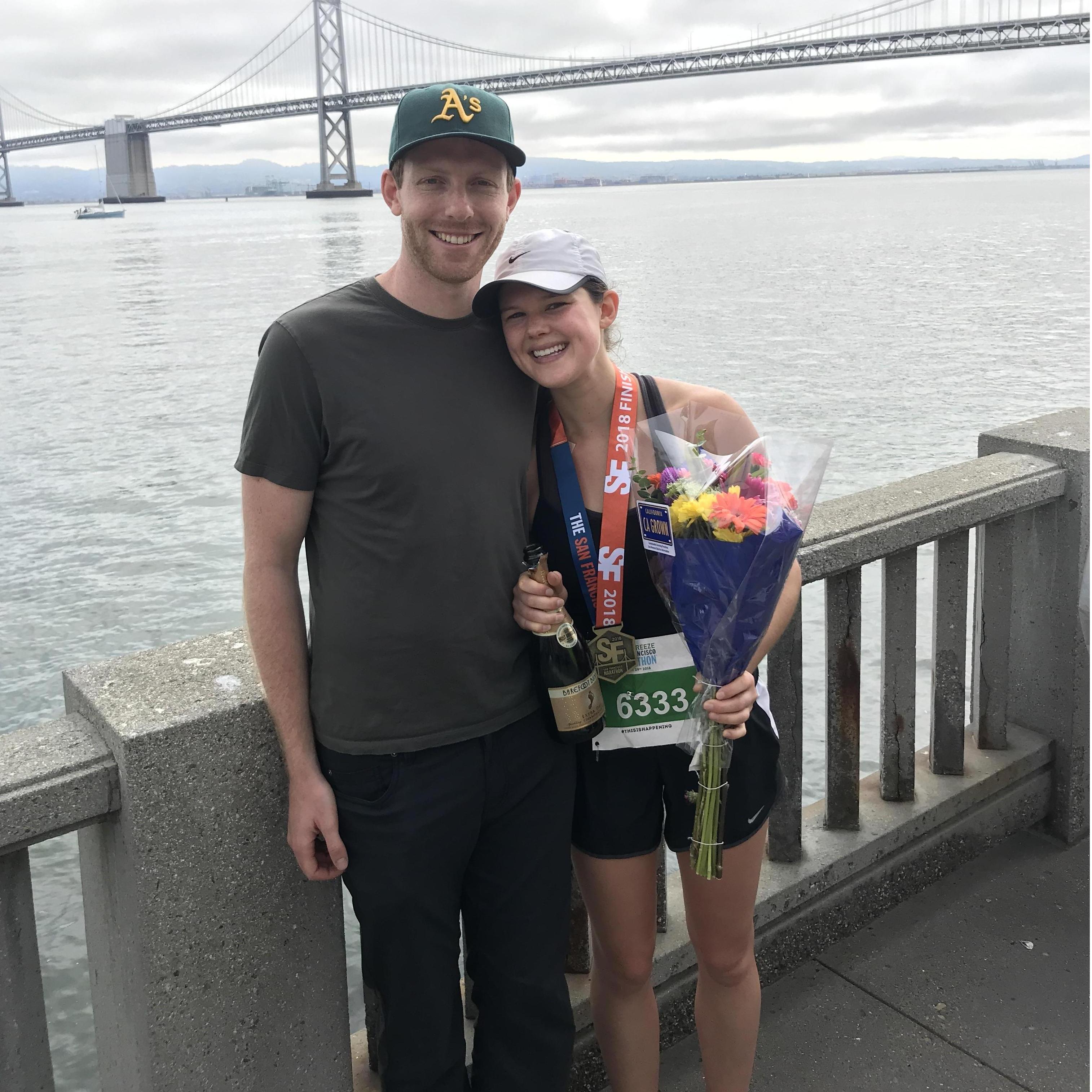 When Cora ran the San Francisco Marathon in 2018, Cary was ready at the finish line with flowers and champagne.