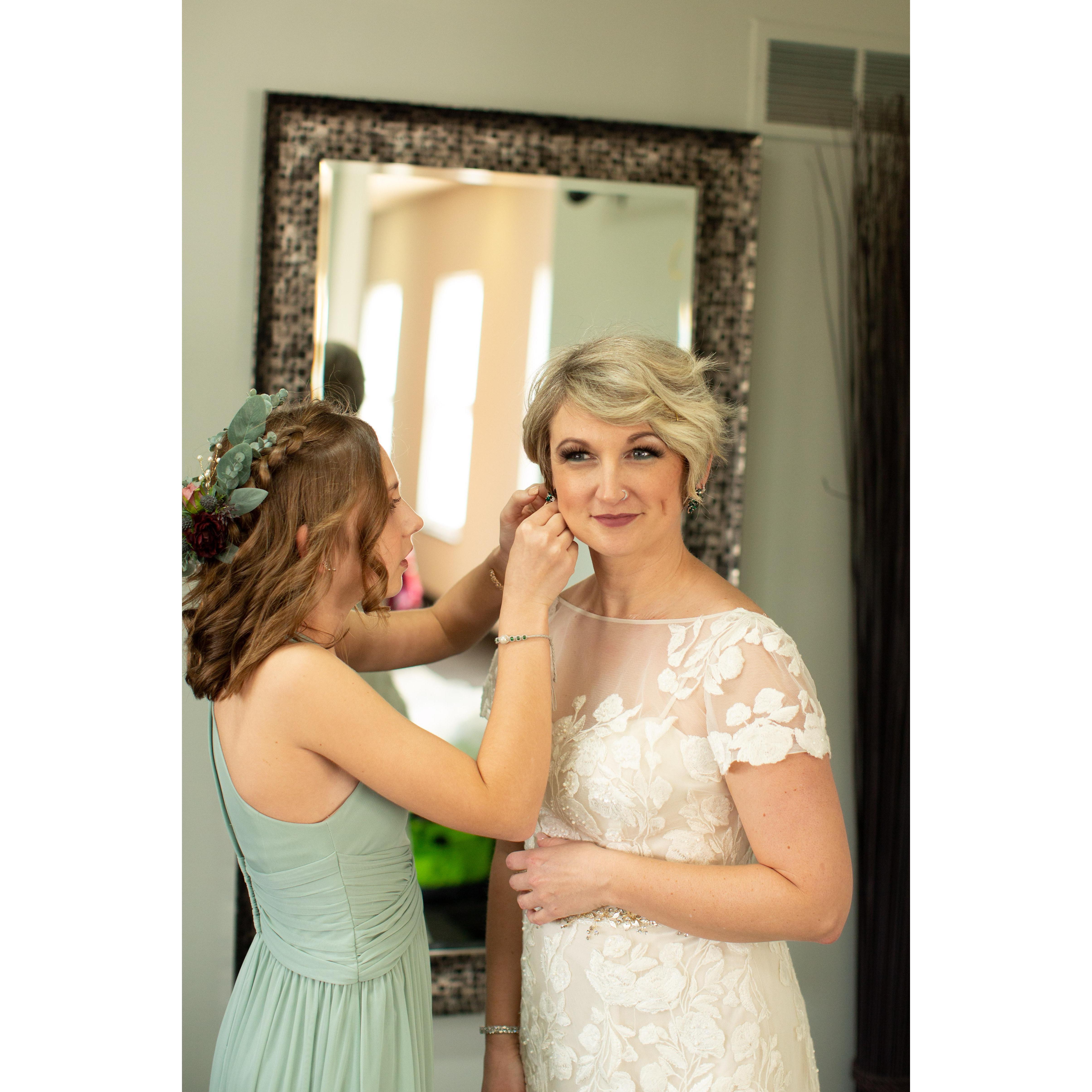 Sophia helping her momma get ready.