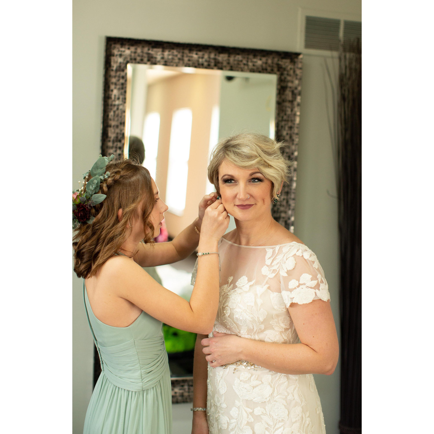 Sophia helping her momma get ready.