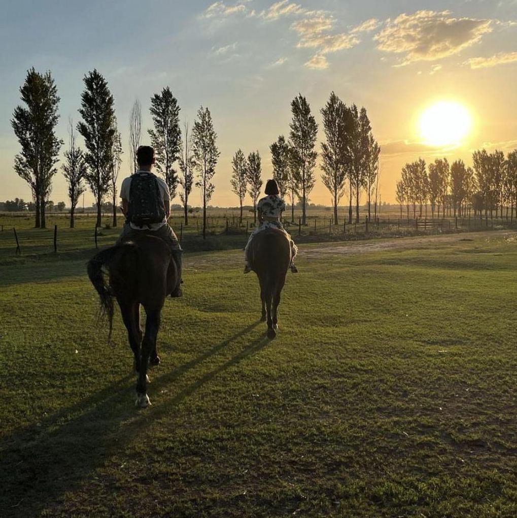 Riding horses bareback on a farm in Argentina together!