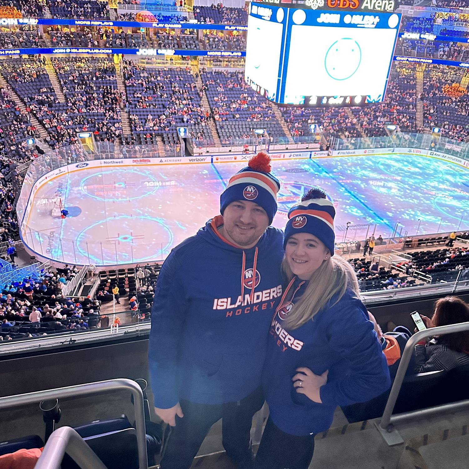 Jeremy and Hannah enjoying a hockey game cheering on the NY Islanders!