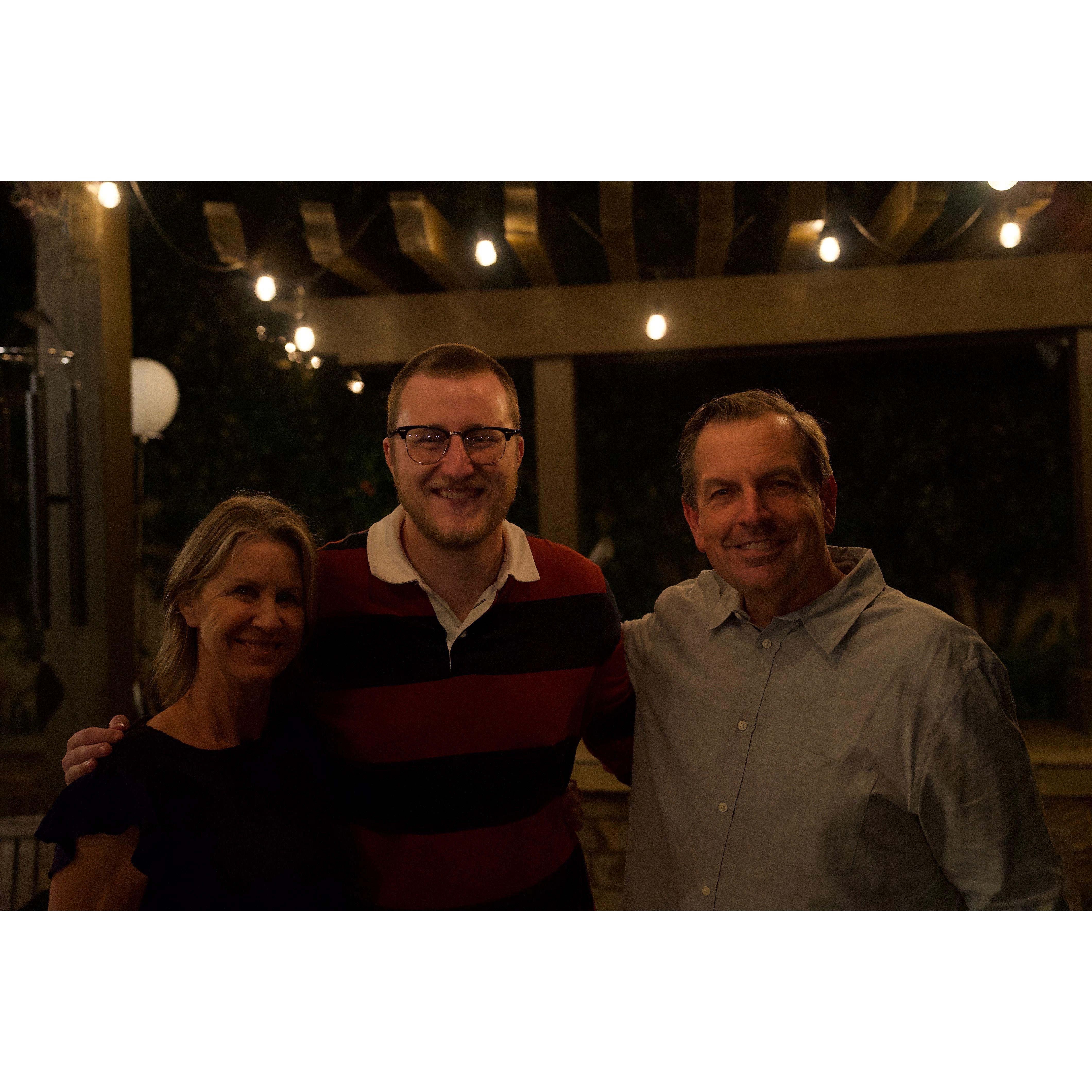 Michael with Devon's parents, Allan and Andrea, the night of our engagement