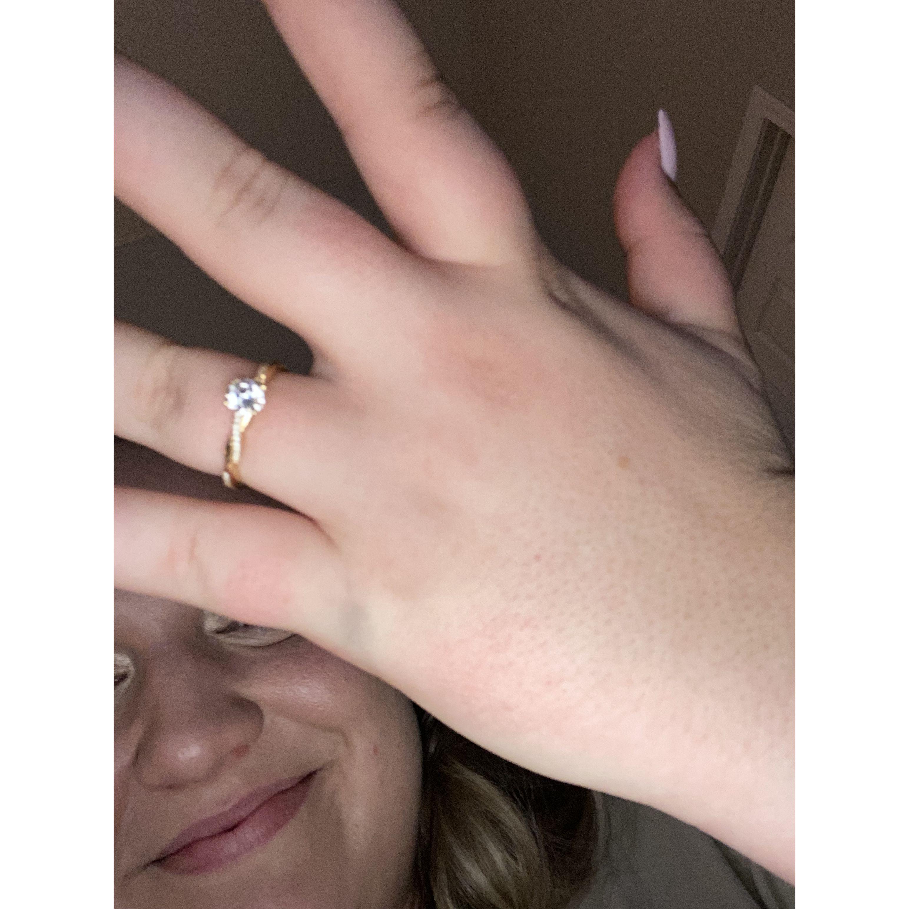 Showing friends and family the ring.. lol