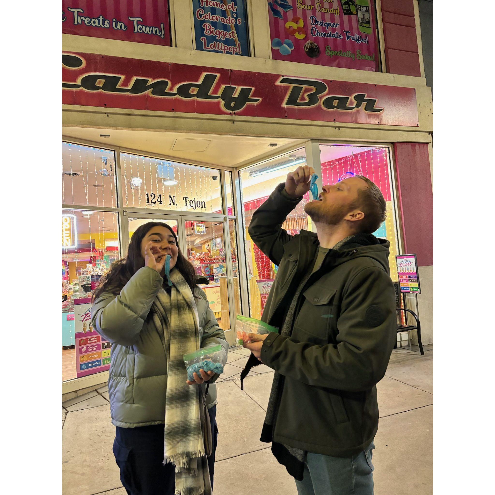 Lore and Ryan eating gummy strips.