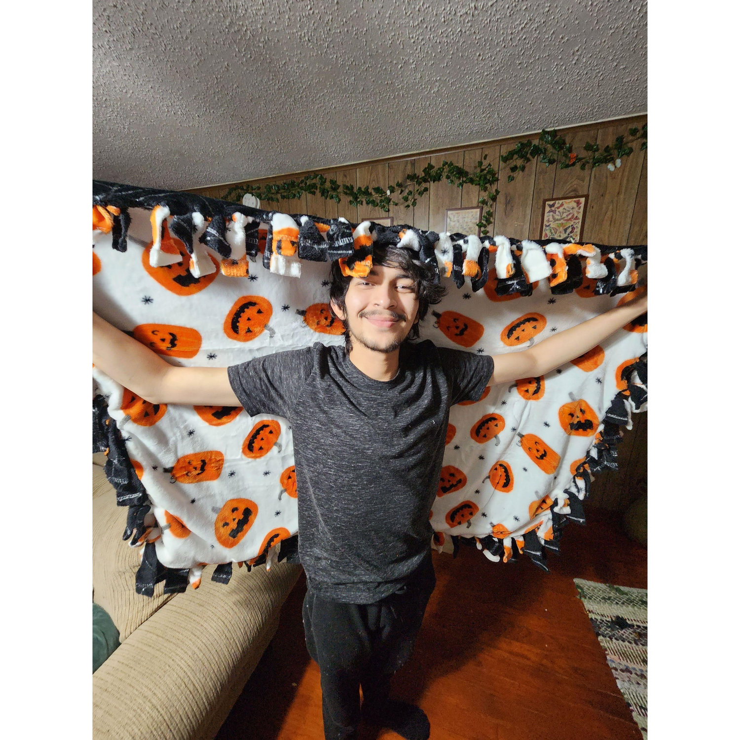 Halloween 2023 was WAY more laid back. We watched spooky movies and made this blanket.