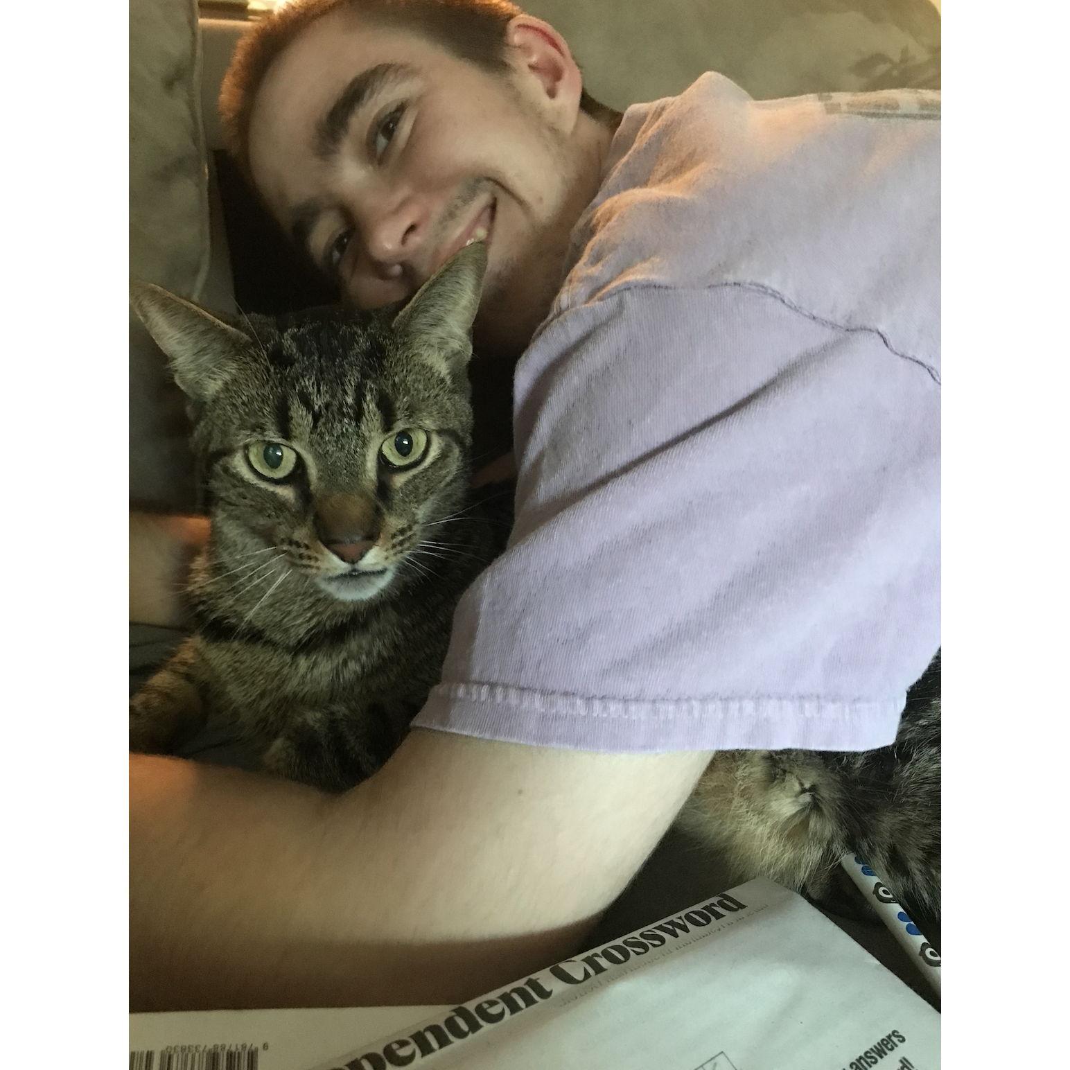 EP: I was hesitant about living with Emily's cat (all that fur!) But once we moved into our current place, I fell in love with Emily (not pictured) - and Edward (pictured here)!