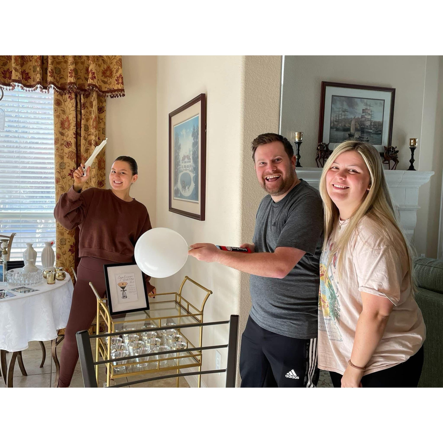 Meanwhile, another surprise was in store back in Flower Mound at Melissa's parents' house where her friends helped decorate for a surprise party!