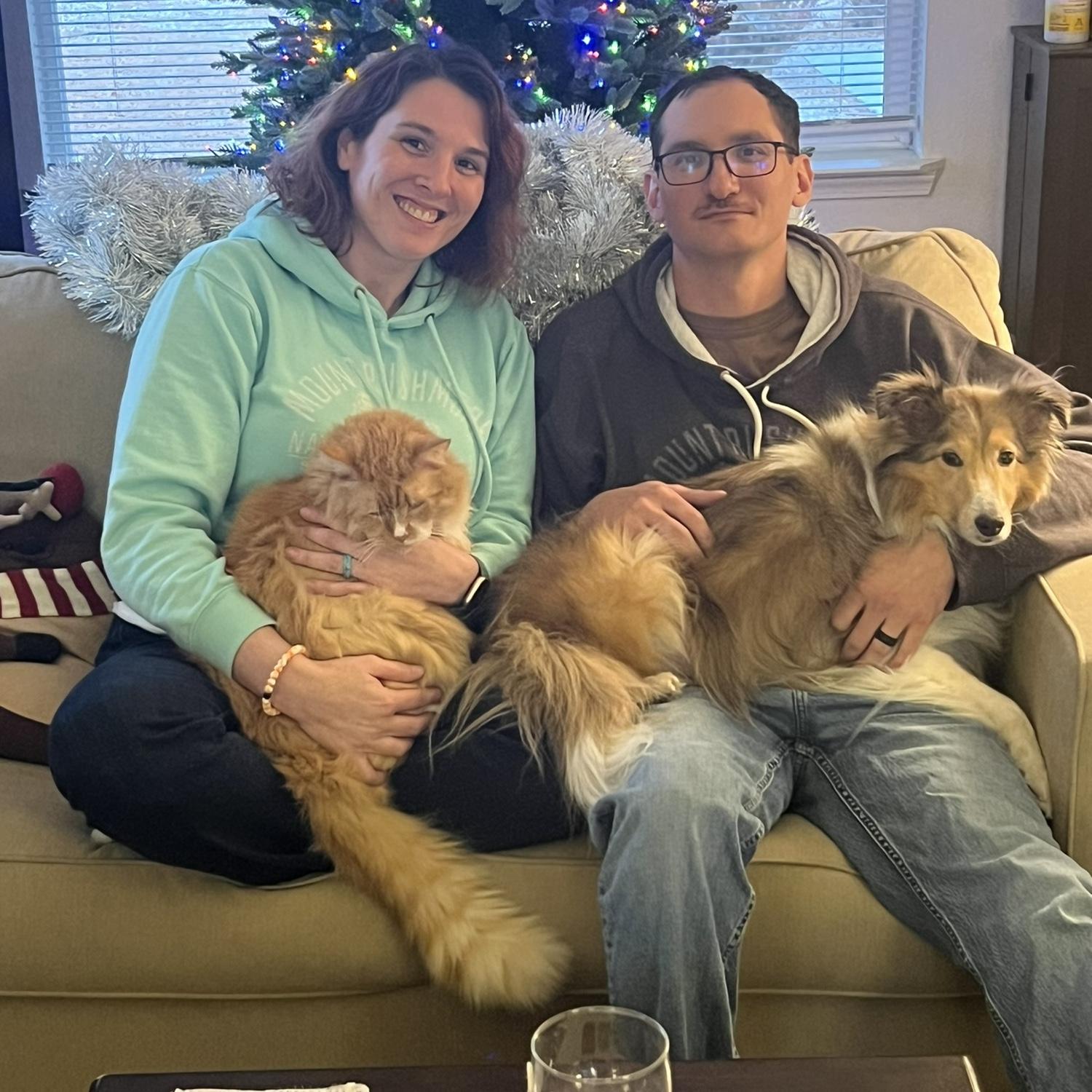 Our Christmas photo from 2023 with Archie and Bucky. This marked a special time as it was our first Christmas as a married couple.