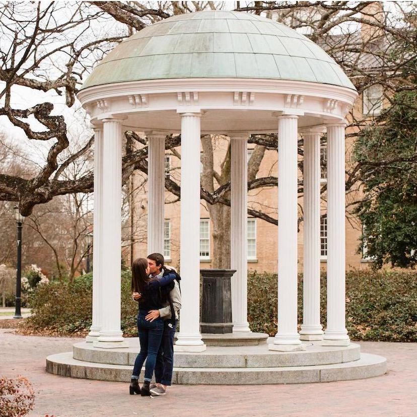 Mark proposing in front of the UNC Old Well (2021)