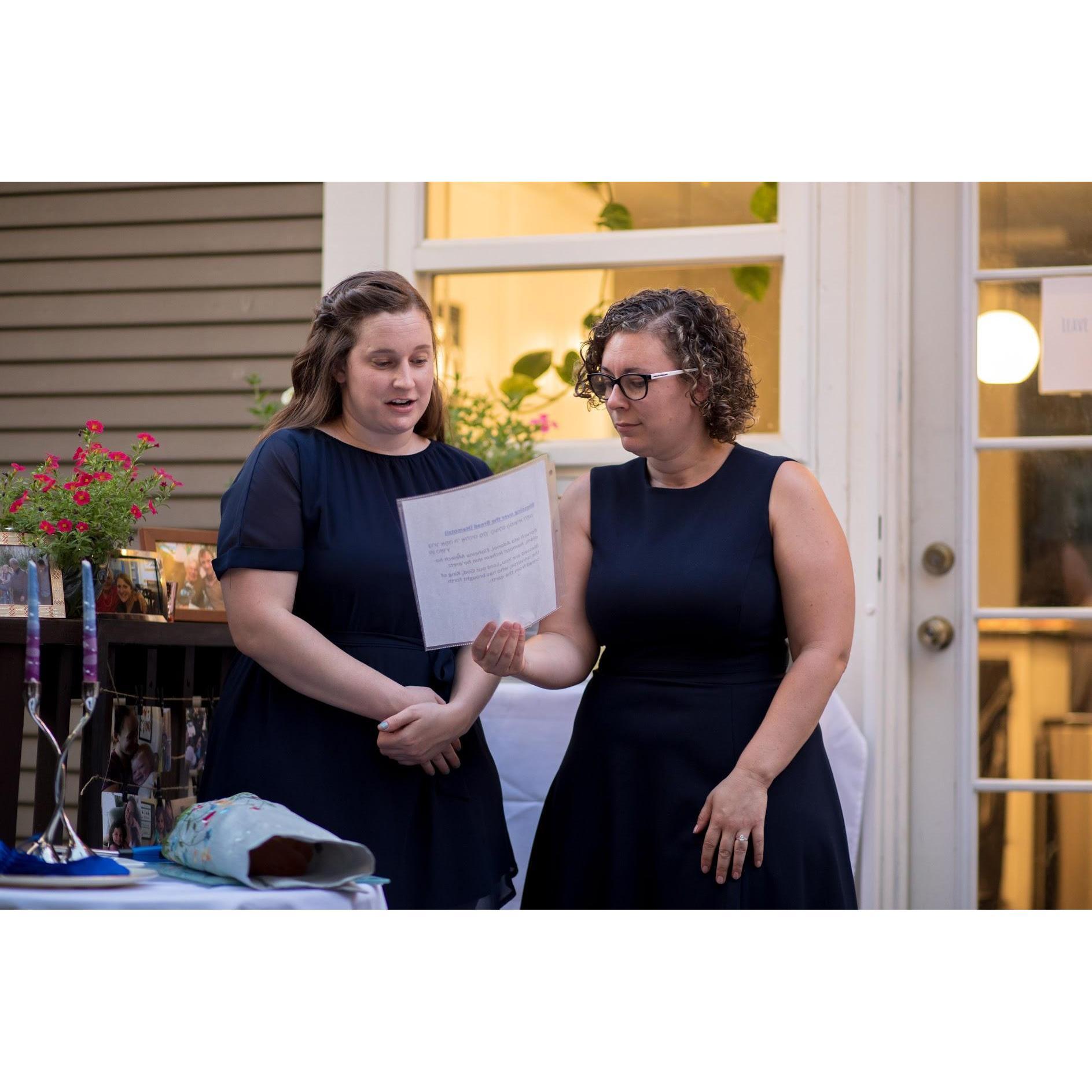 Rachel's sisters, Emily & Allison sharing a blessing for Shabbat