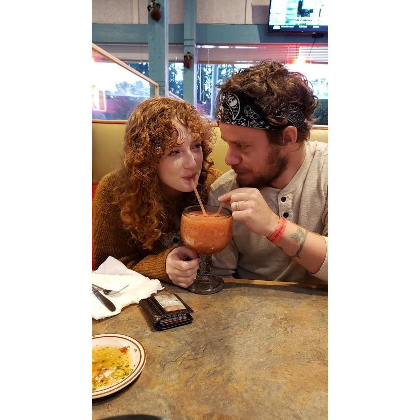 The happy couple enjoying a delicious blended strawberry margarita! Like mother like daughter ;)