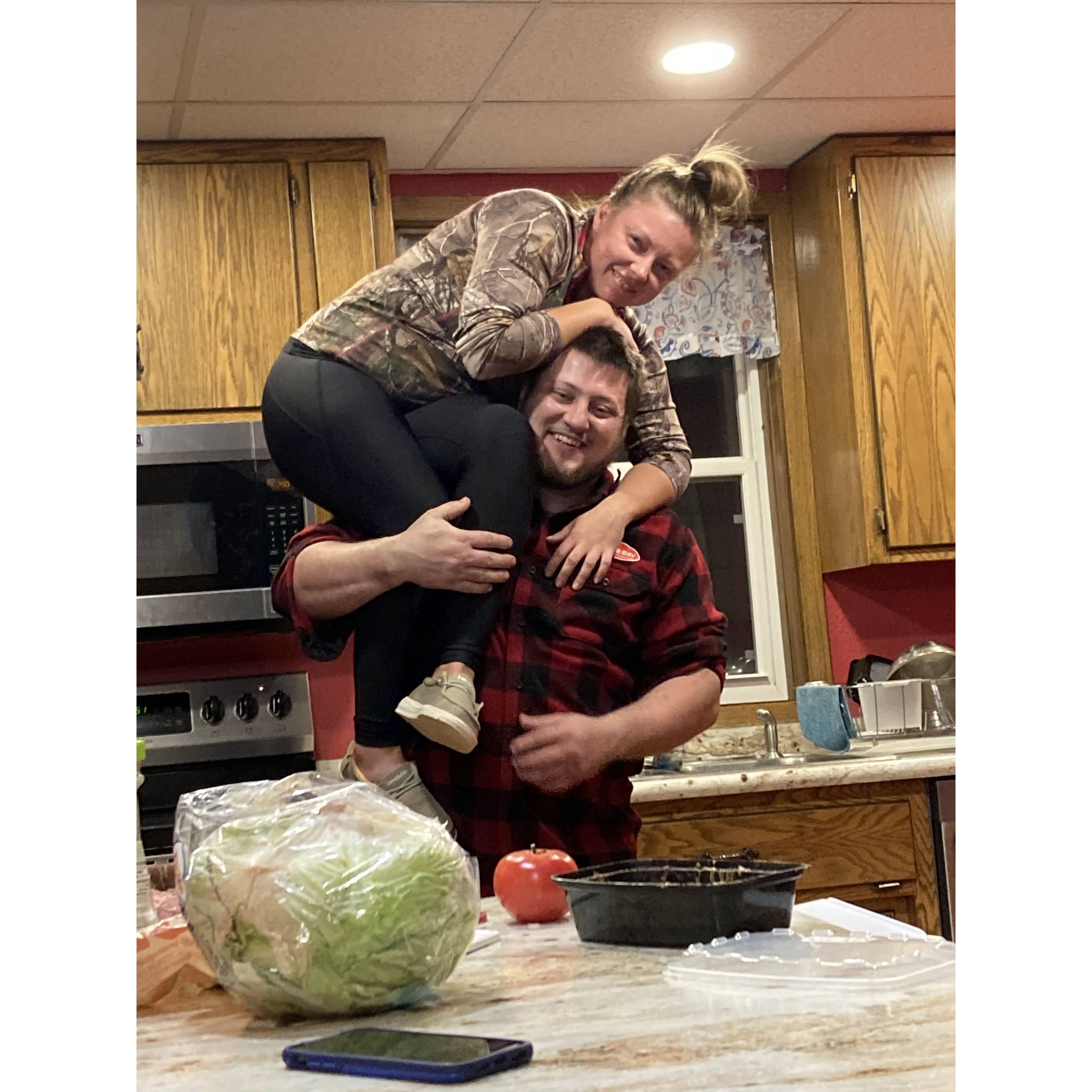 Kyle always ready and willing to give Anna a lift . . . even in the middle of making dinner for Anna and her TB girls!